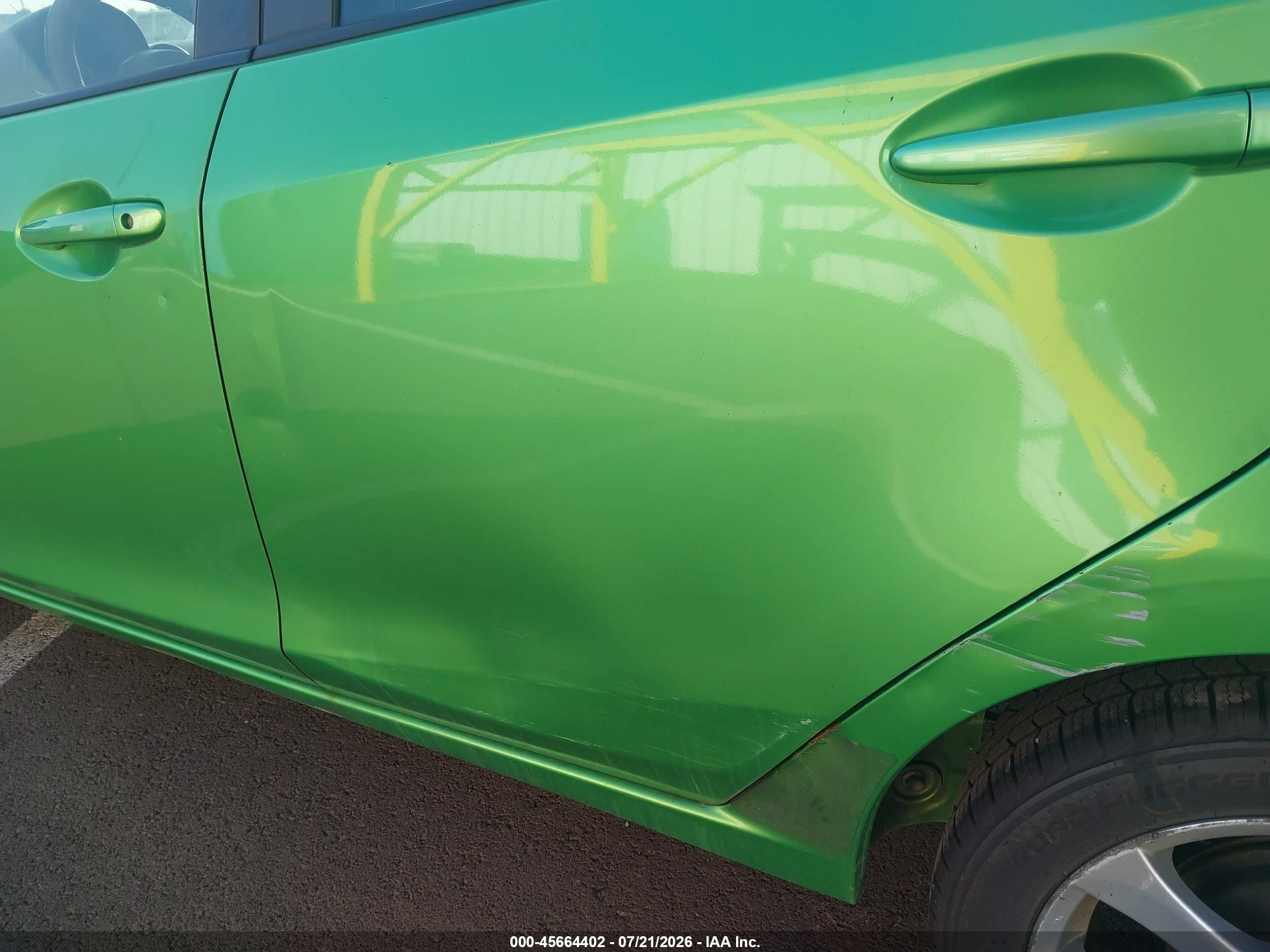 2011 Mazda Mazda2 Touring Green vin: JM1DE1HY1B0115325