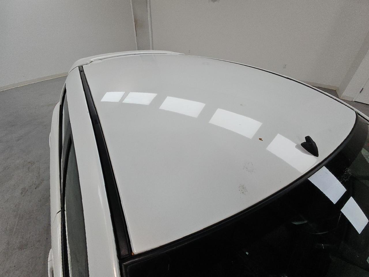 2011 Mazda Mazda2 White vin: JM1DE1HY9B0102998 Damage: Roof, Rust, 1/8 To 1/2 Inch
