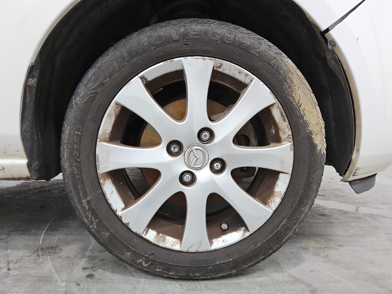 2011 Mazda Mazda2 White vin: JM1DE1HY9B0102998 Damage: Right Front Wheel, Curb Rash, > 12 Inches