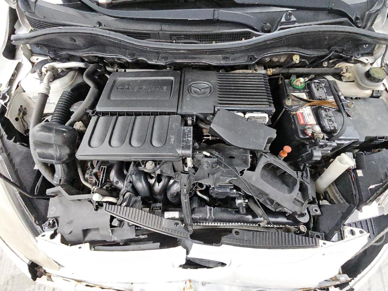 2011 Mazda Mazda2 White vin: JM1DE1HY9B0102998 Damage: Fluid Level Coolant, Low Fluid, Unacceptable