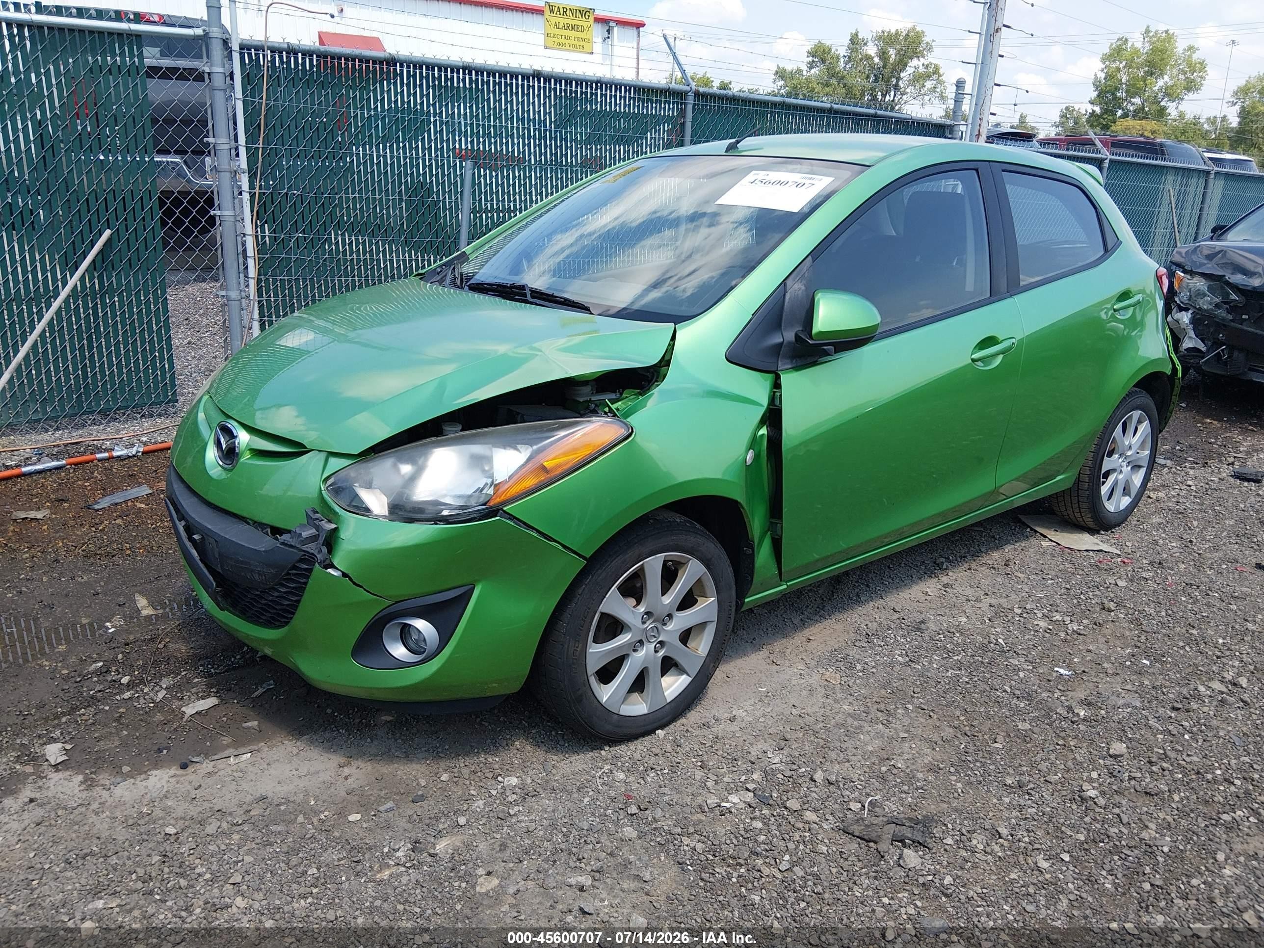 2011 Mazda Mazda2 Touring Green vin: JM1DE1HYXB0102461