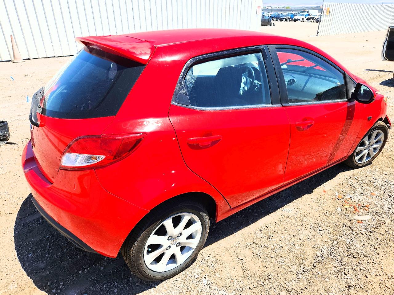 2011 Mazda Mazda2 Red vin: JM1DE1HZ7B0102099