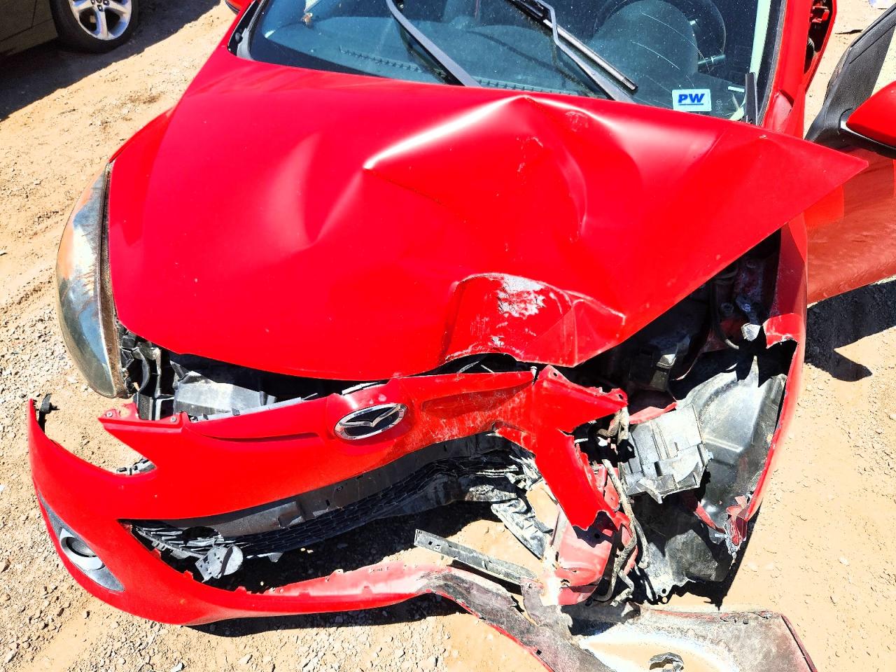 2011 Mazda Mazda2 Red vin: JM1DE1HZ7B0102099