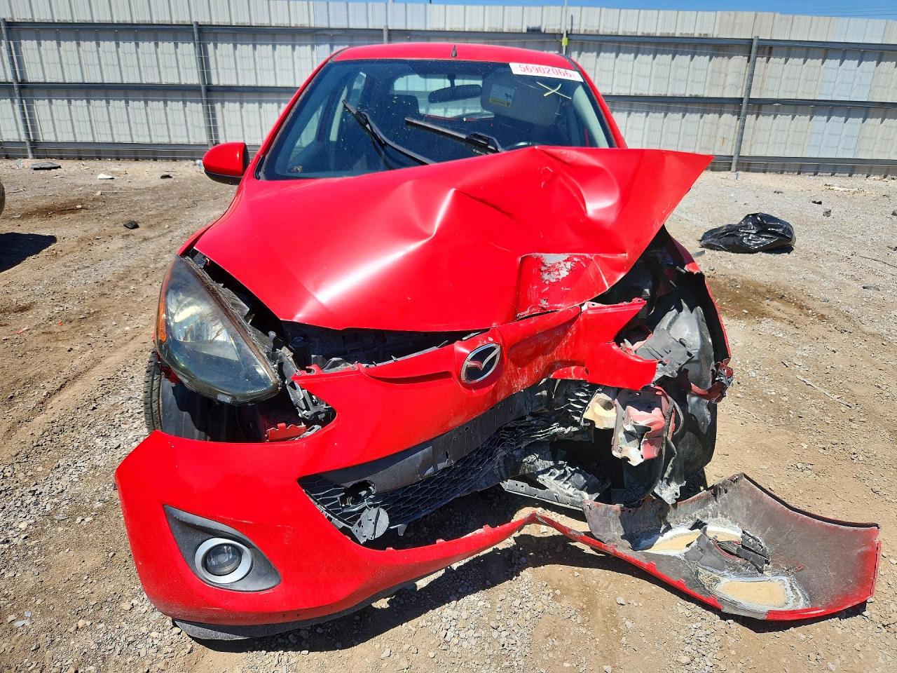 2011 Mazda Mazda2 Red vin: JM1DE1HZ7B0102099