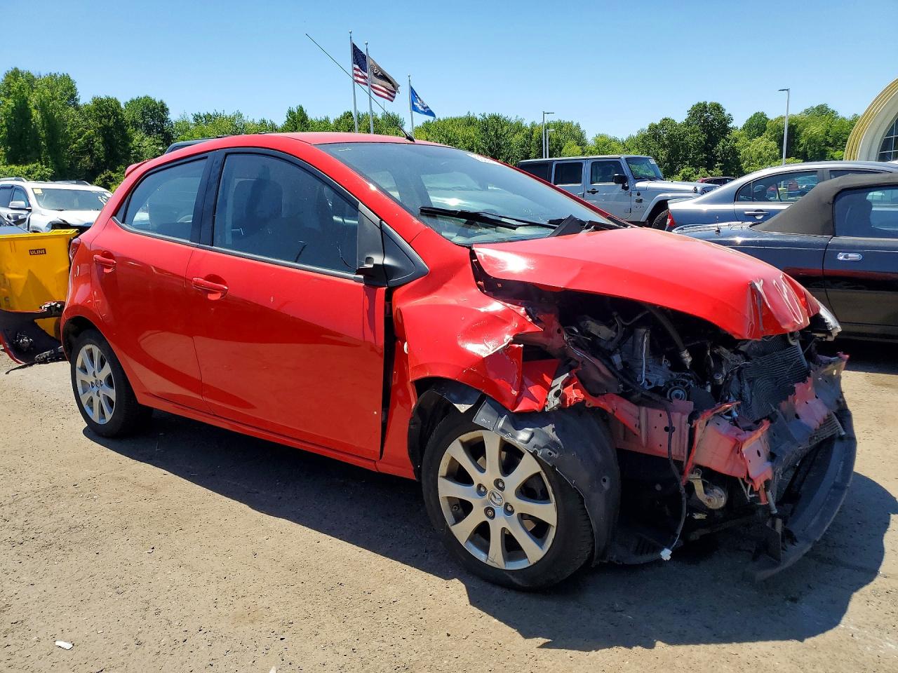 2011 Mazda Mazda2 Red vin: JM1DE1HZ8B0104556