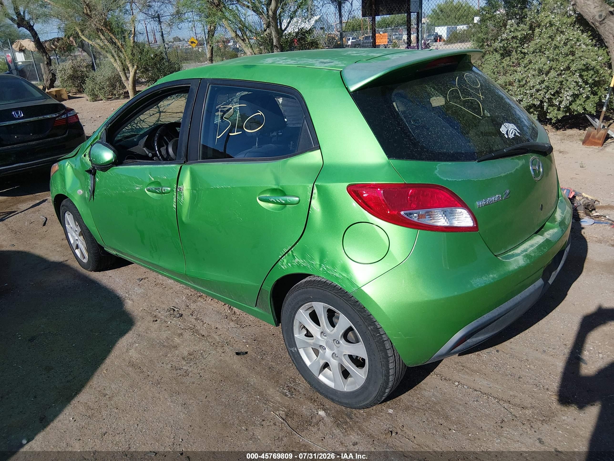 2011 Mazda Mazda2 Touring Green vin: JM1DE1HZ8B0112804