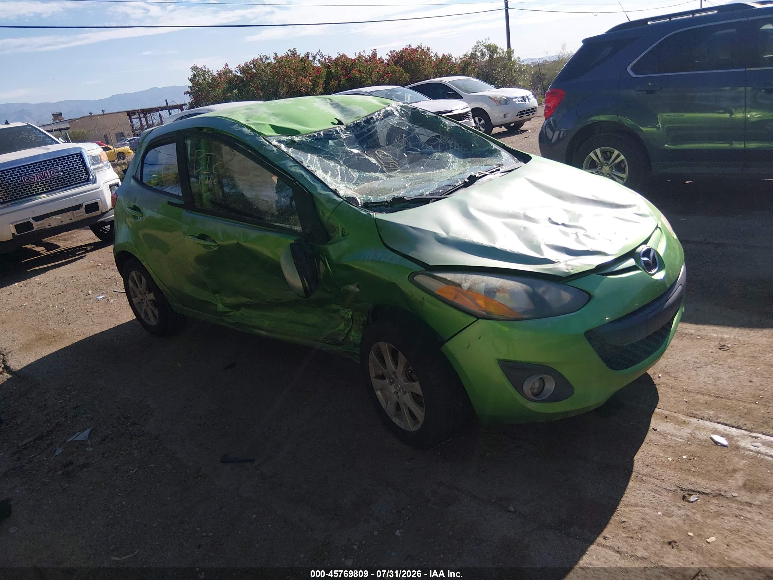 2011 Mazda Mazda2 Touring Green vin: JM1DE1HZ8B0112804