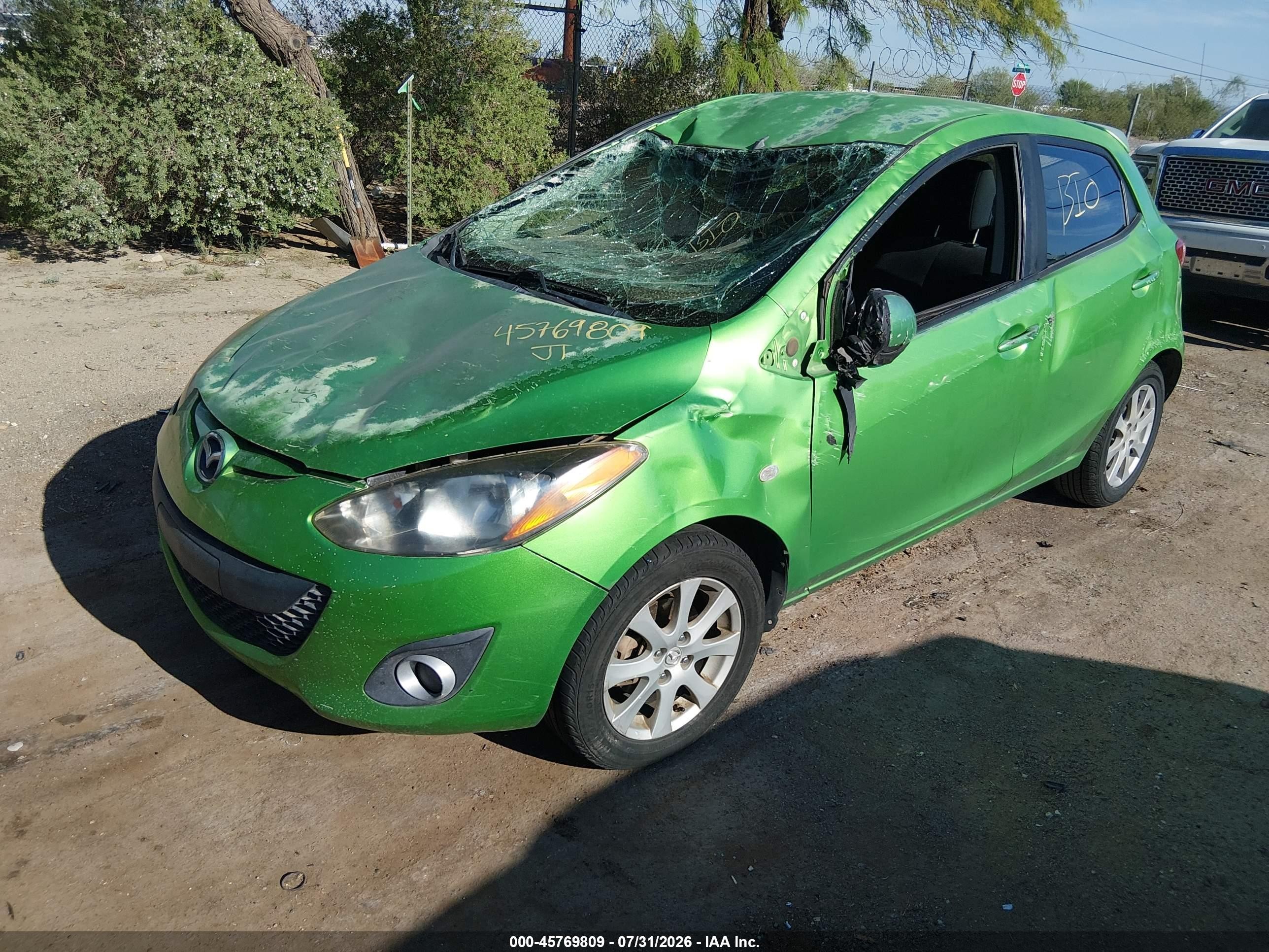 2011 Mazda Mazda2 Touring Green vin: JM1DE1HZ8B0112804