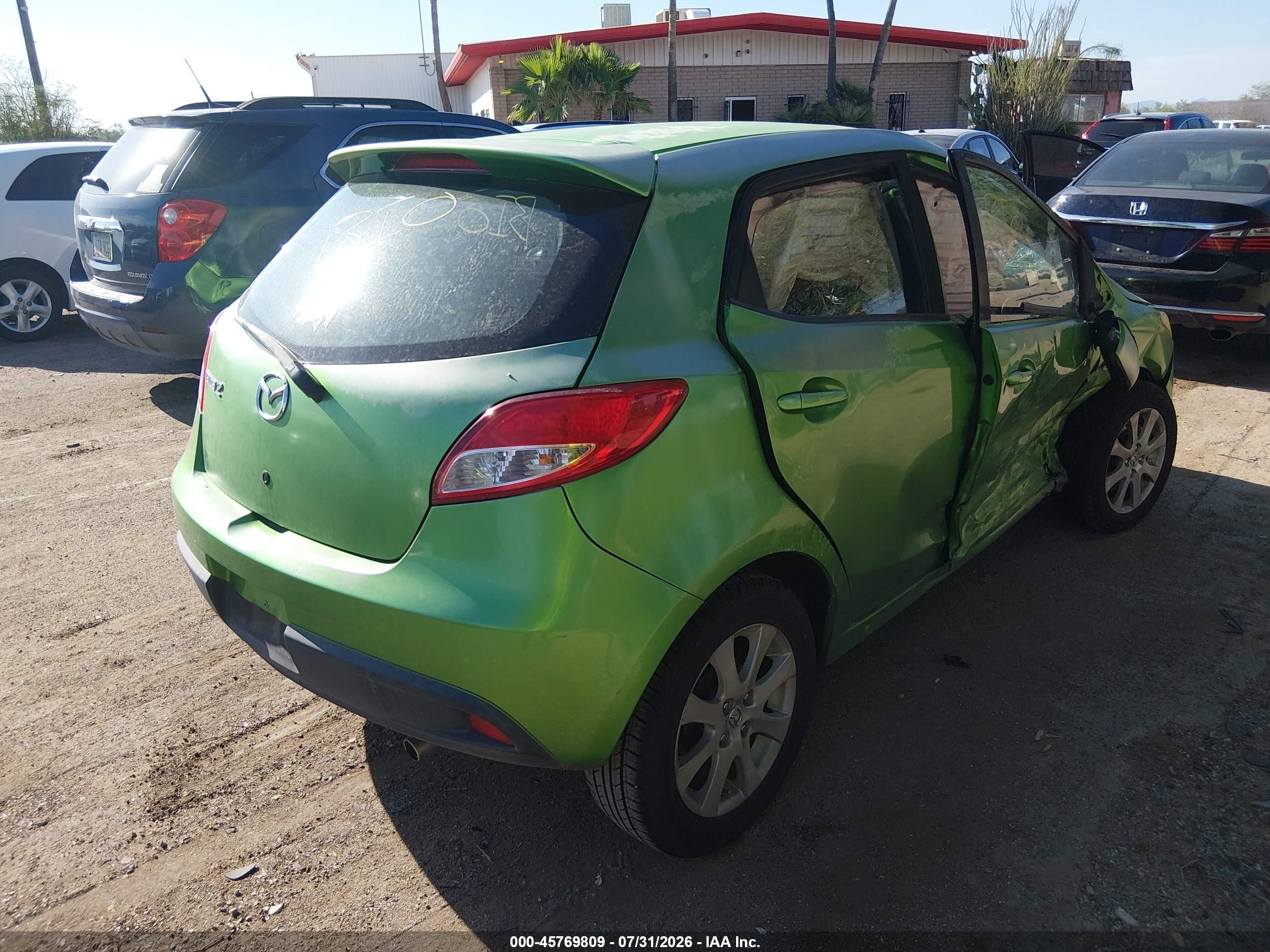 2011 Mazda Mazda2 Touring Green vin: JM1DE1HZ8B0112804