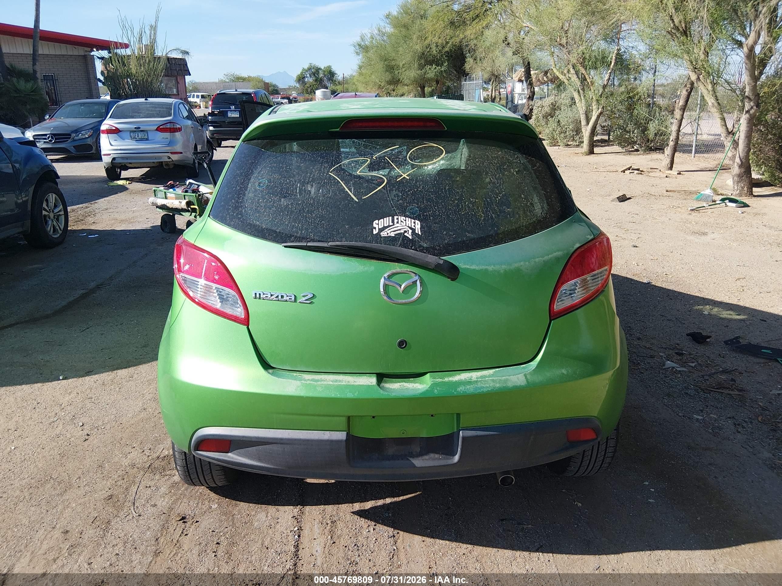 2011 Mazda Mazda2 Touring Green vin: JM1DE1HZ8B0112804