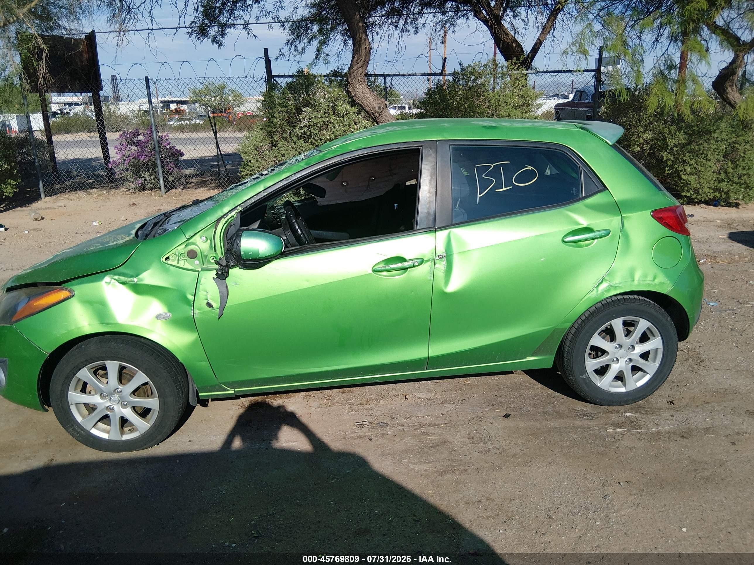 2011 Mazda Mazda2 Touring Green vin: JM1DE1HZ8B0112804