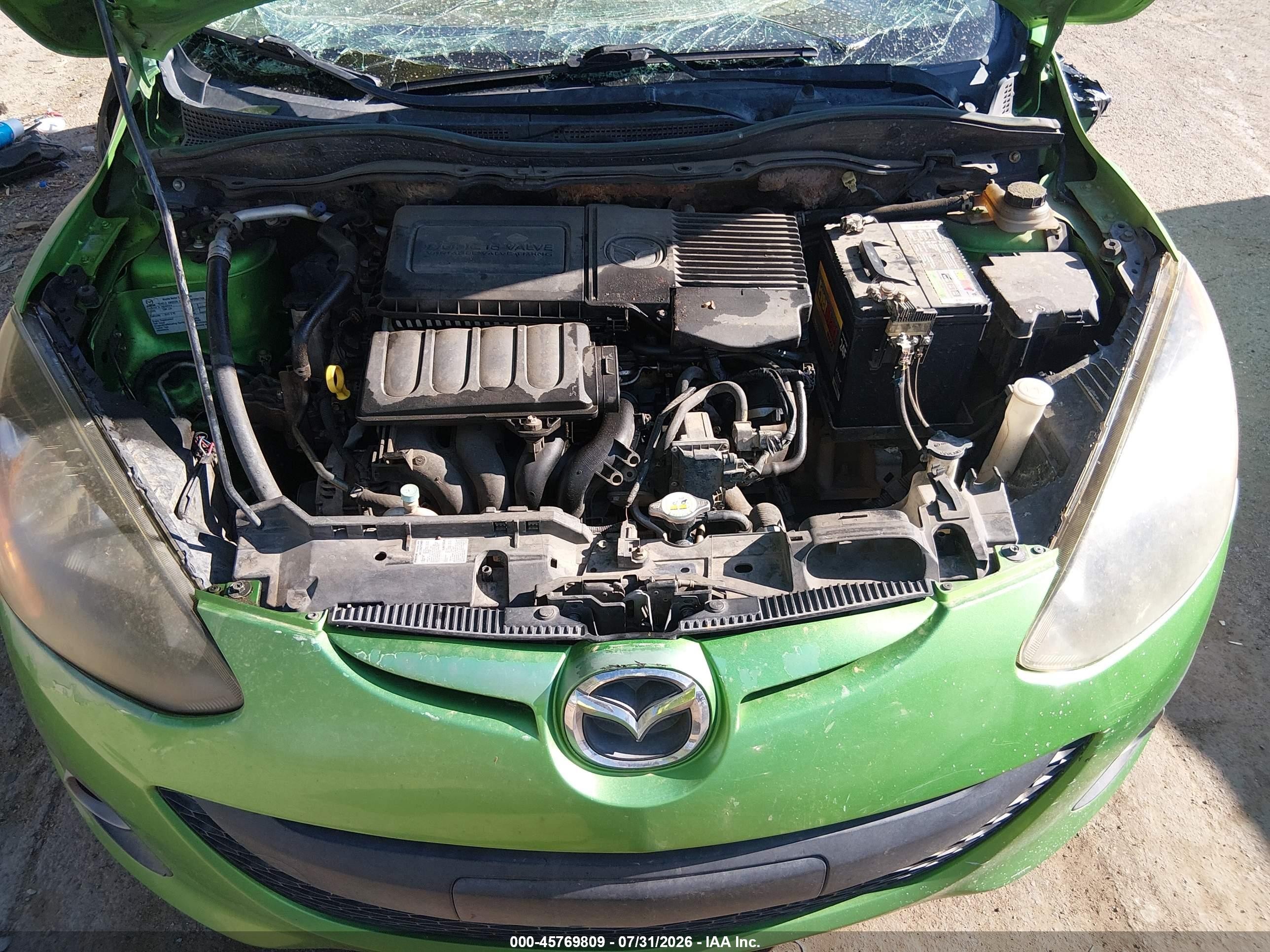 2011 Mazda Mazda2 Touring Green vin: JM1DE1HZ8B0112804