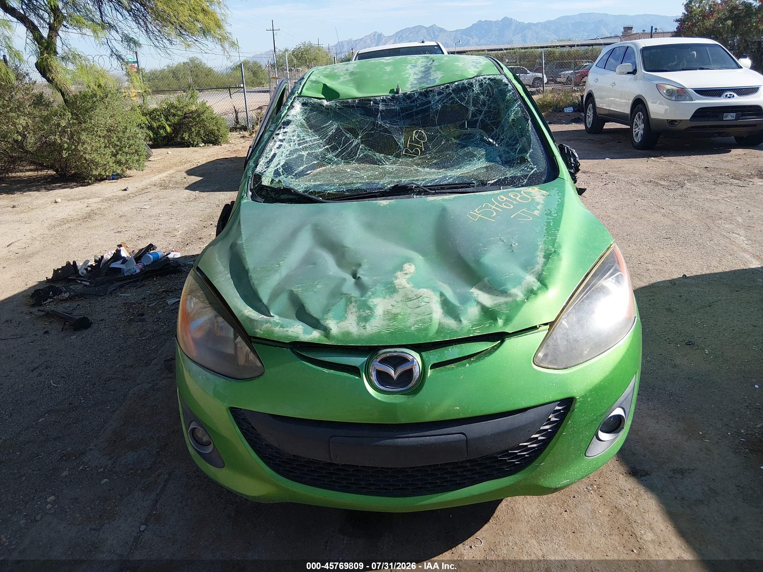 2011 Mazda Mazda2 Touring Green vin: JM1DE1HZ8B0112804
