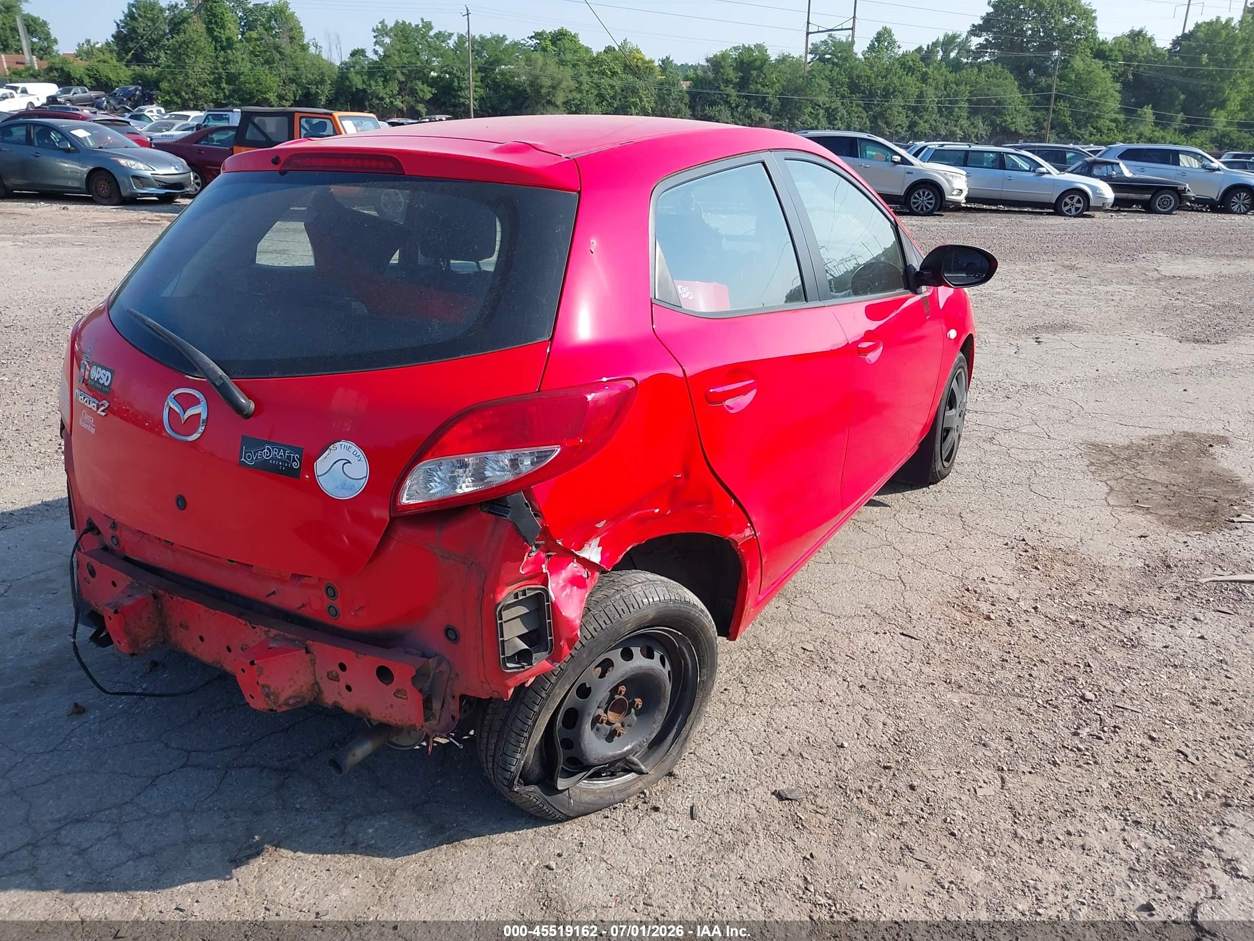 2011 Mazda Mazda2 Sport Red vin: JM1DE1HZ8B0114553