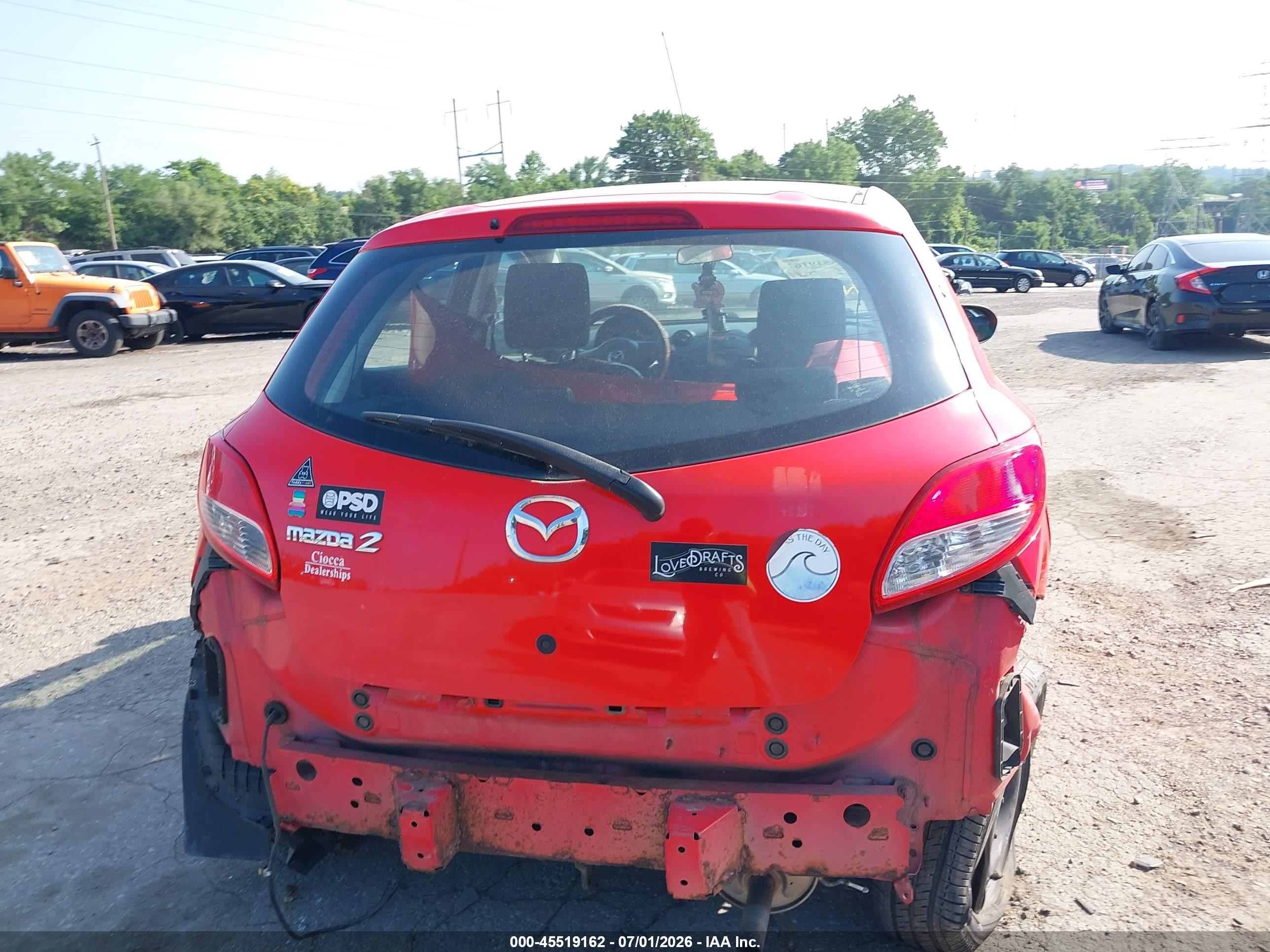 2011 Mazda Mazda2 Sport Red vin: JM1DE1HZ8B0114553
