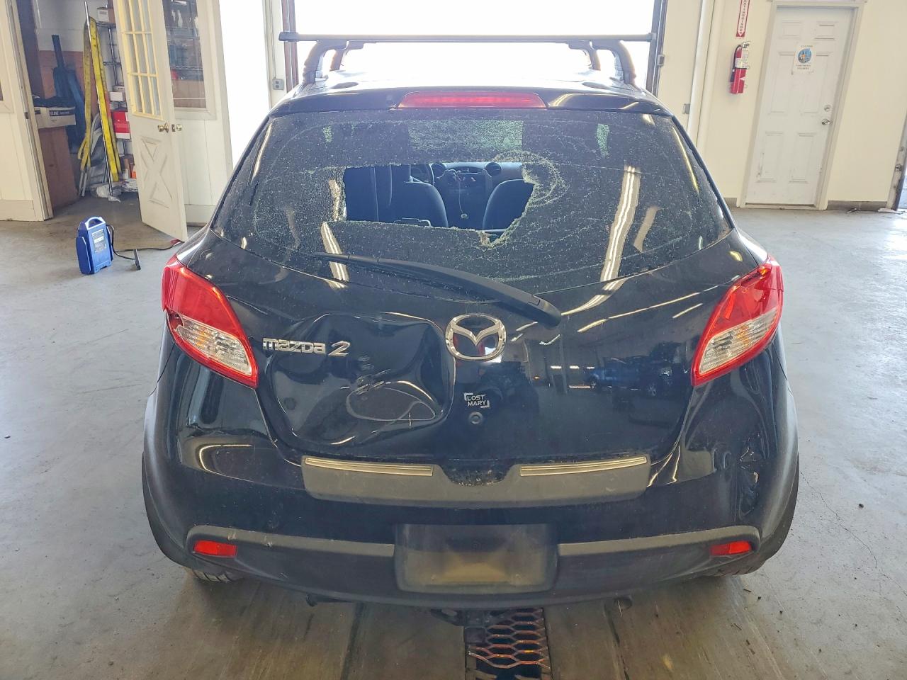 2012 Mazda Mazda2 Black vin: JM1DE1KY2C0133441