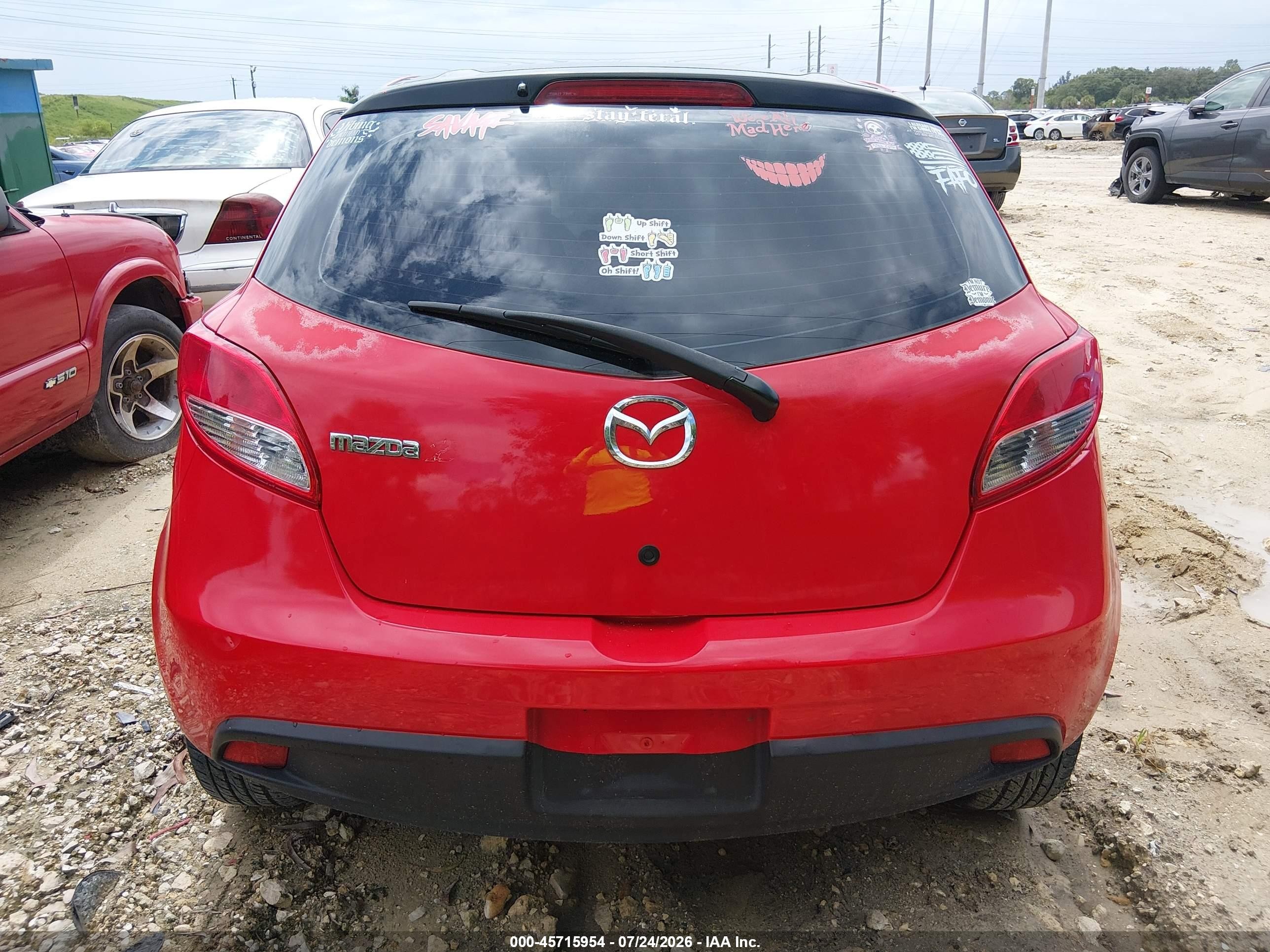 2012 Mazda Mazda2 Sport Red vin: JM1DE1KYXC0140167