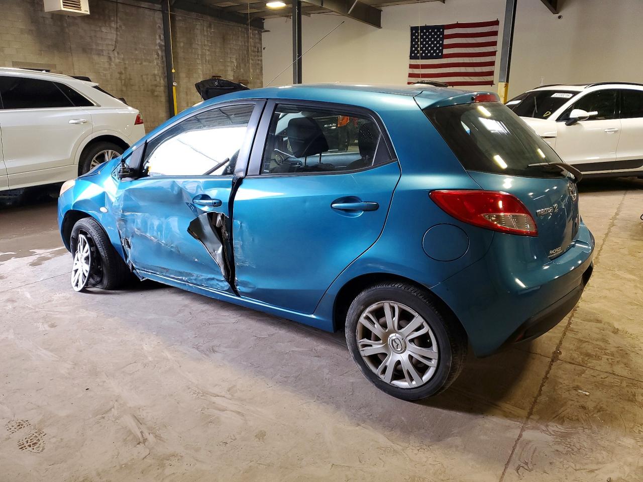 2012 Mazda Mazda2 Blue vin: JM1DE1KZ4C0140948
