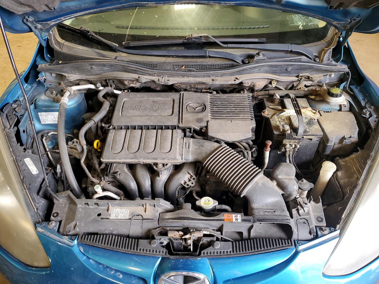 2012 Mazda Mazda2 Blue vin: JM1DE1KZ4C0140948