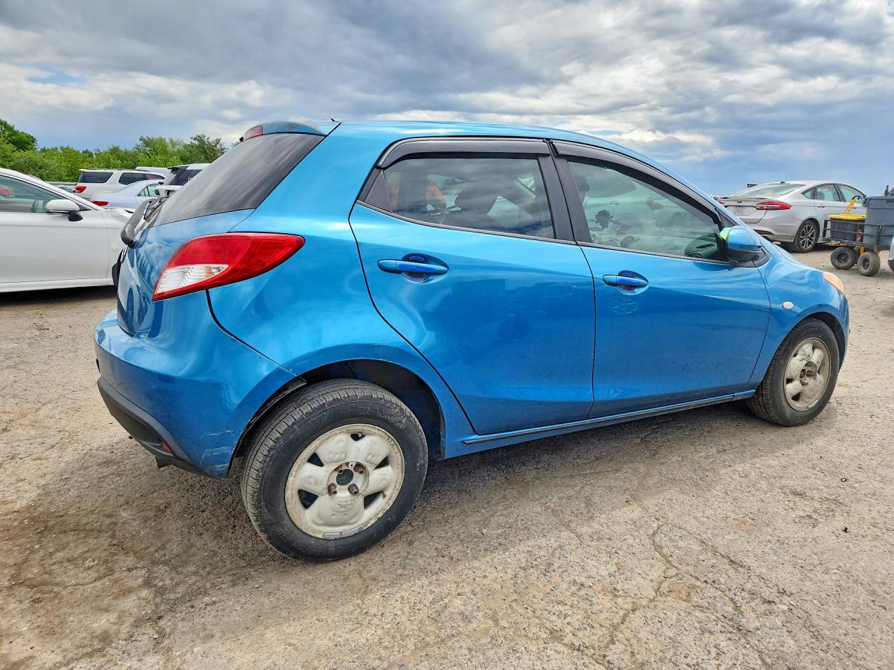 2012 Mazda Mazda2 Blue vin: JM1DE1KZ7C0147103