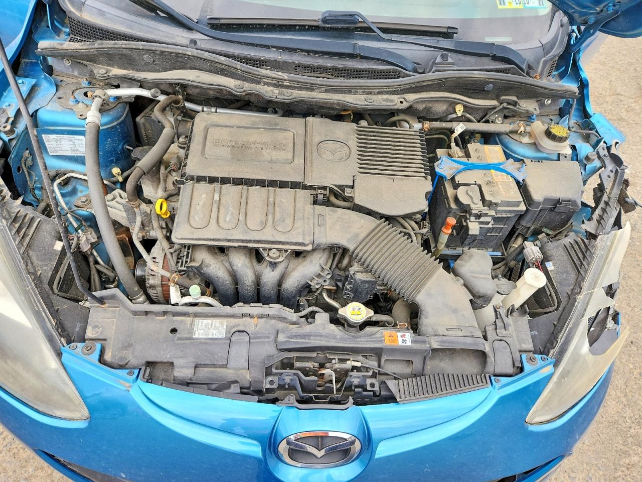 2012 Mazda Mazda2 Blue vin: JM1DE1KZ7C0147103