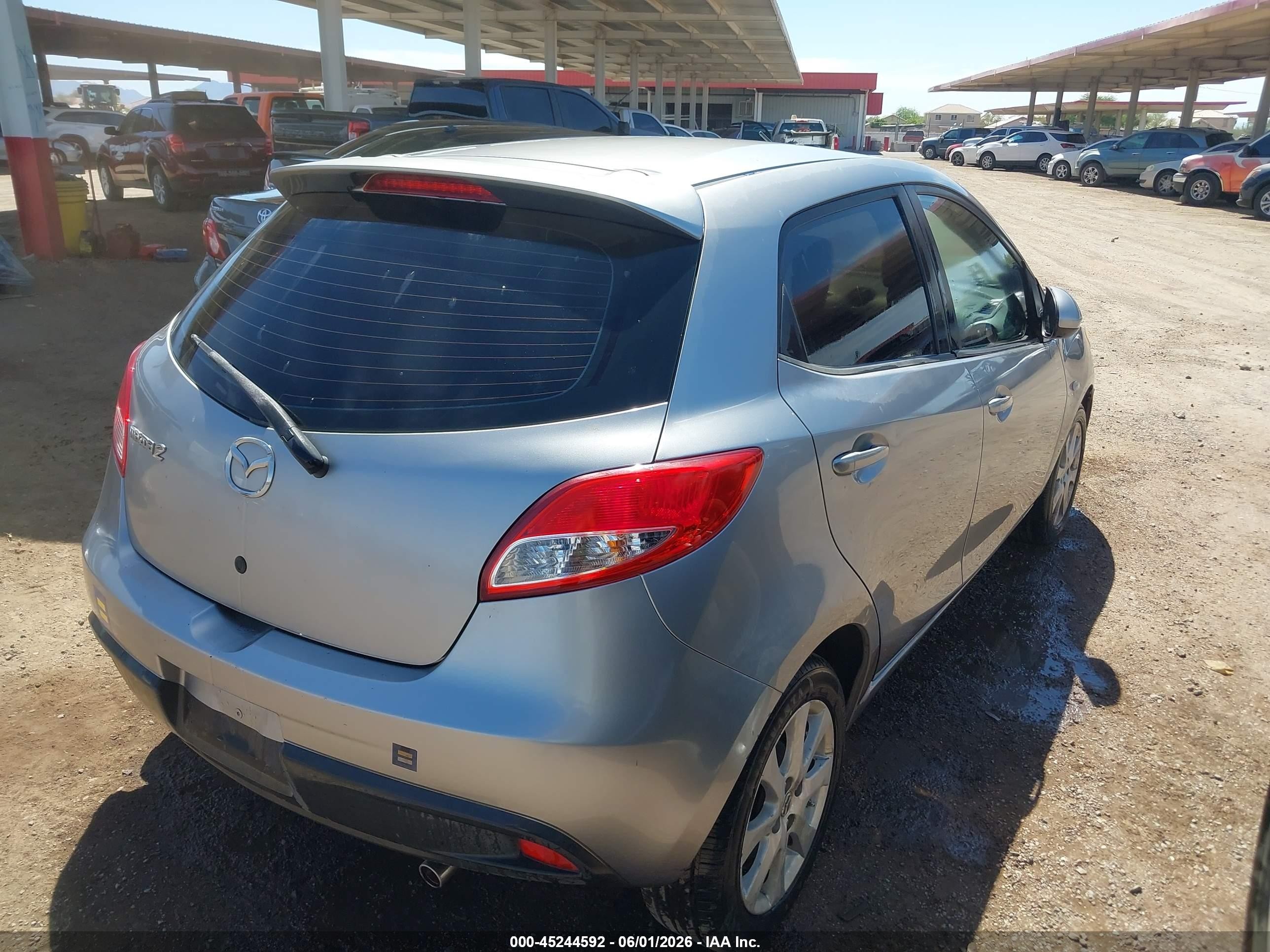 2012 Mazda Mazda2 Touring Silver vin: JM1DE1LY7C0140657