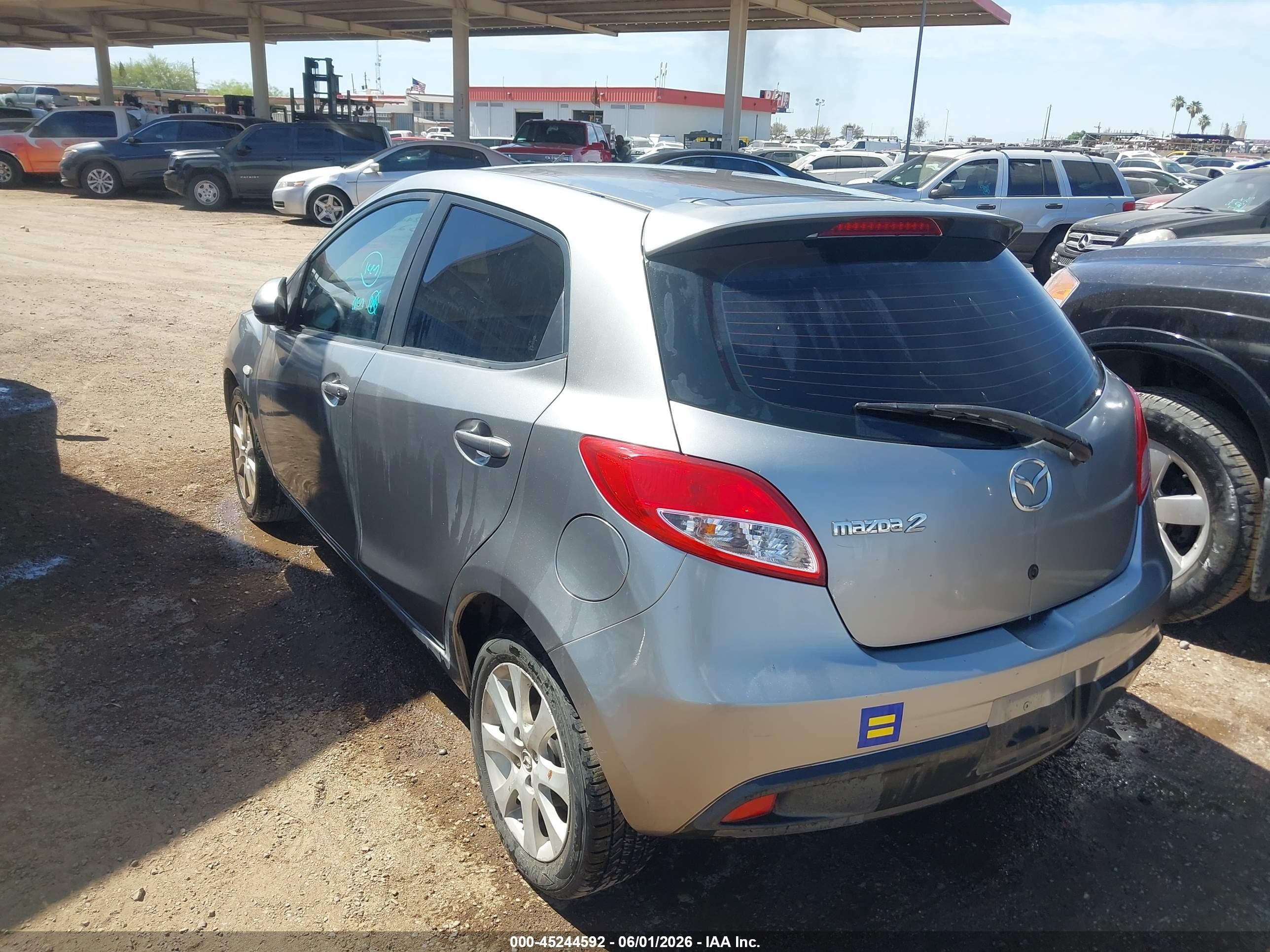 2012 Mazda Mazda2 Touring Silver vin: JM1DE1LY7C0140657