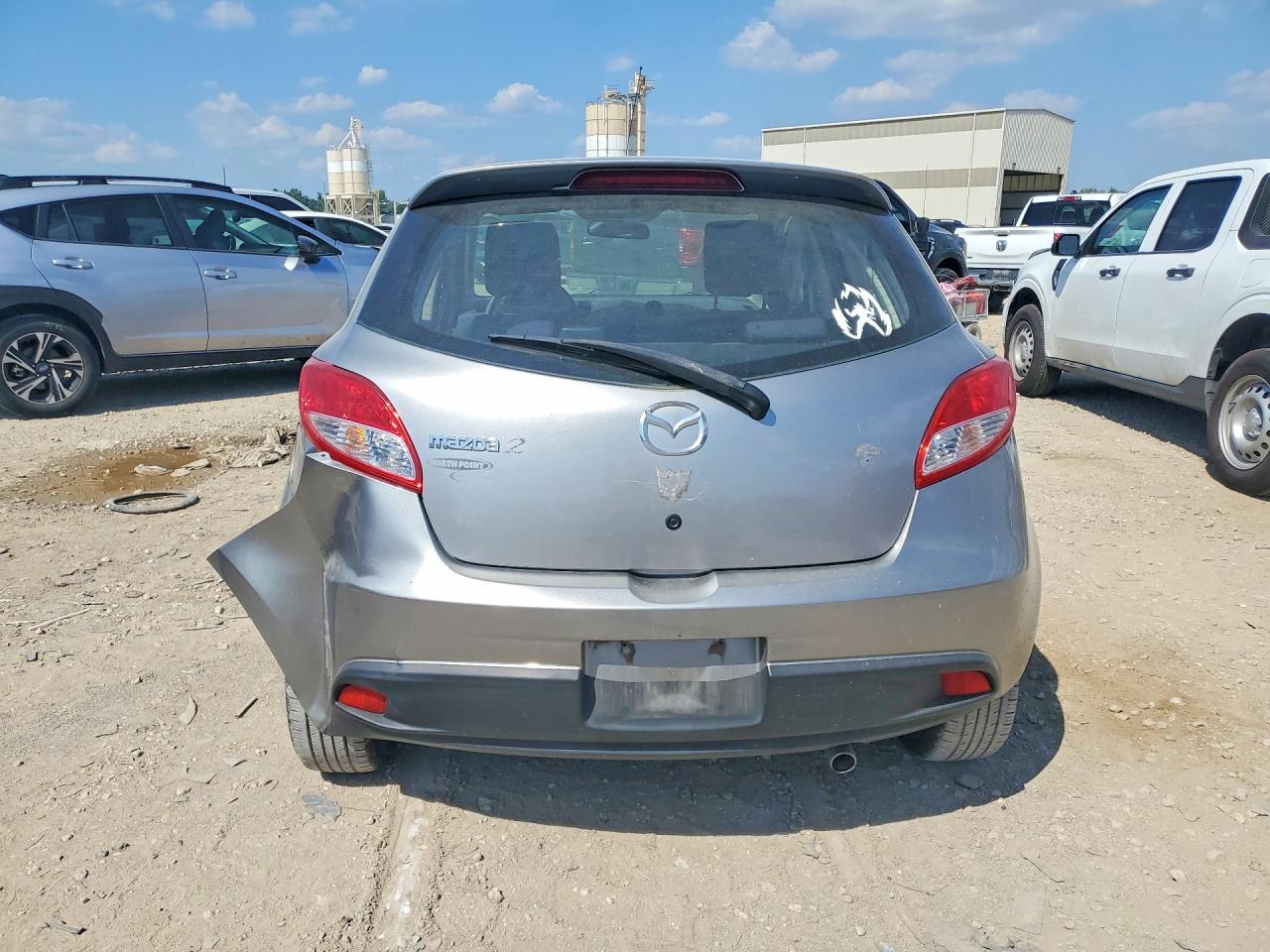 2012 Mazda Mazda2 Серебряный vin: JM1DE1LYXC0136599
