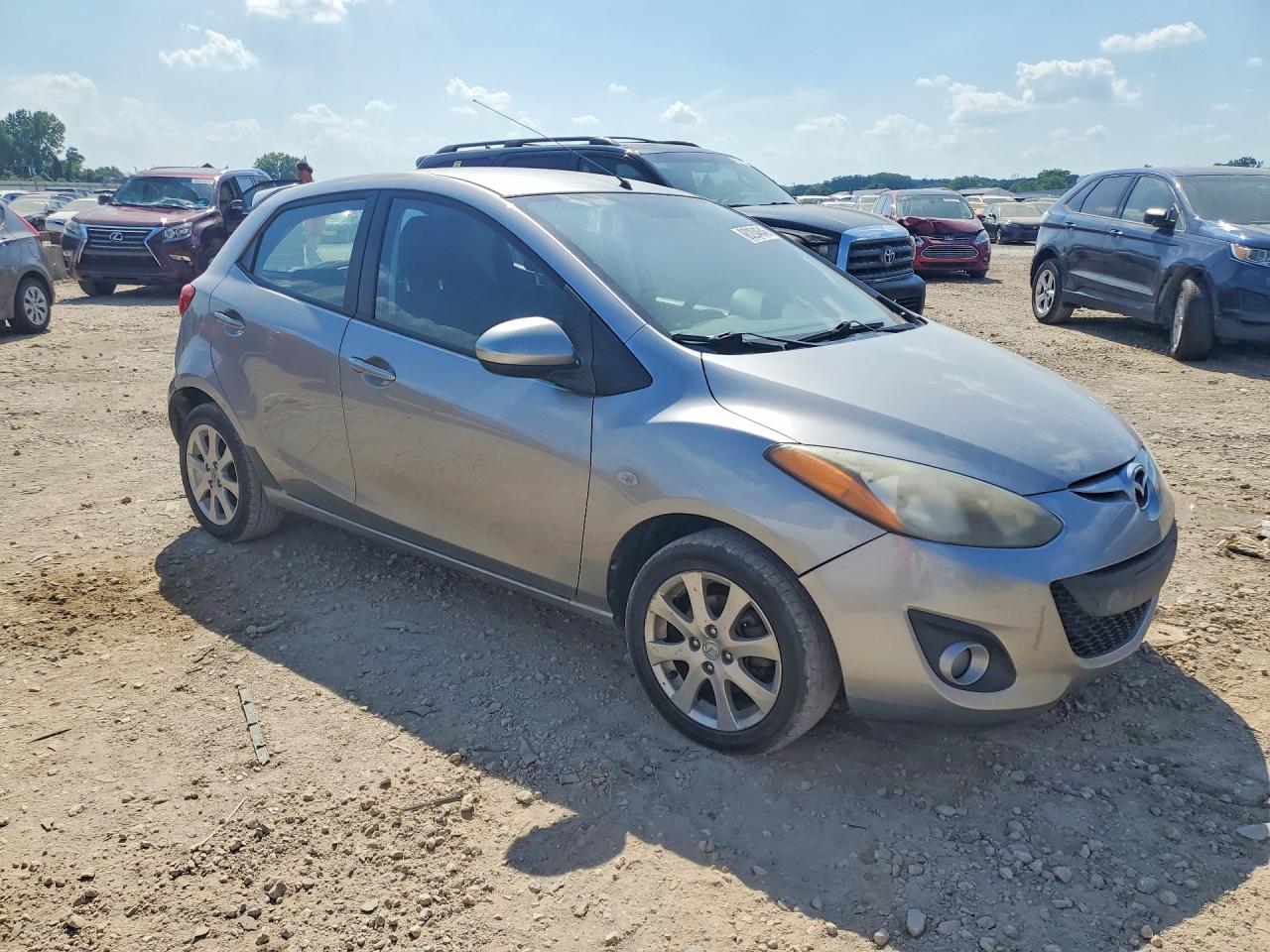 2012 Mazda Mazda2 Серебряный vin: JM1DE1LYXC0136599