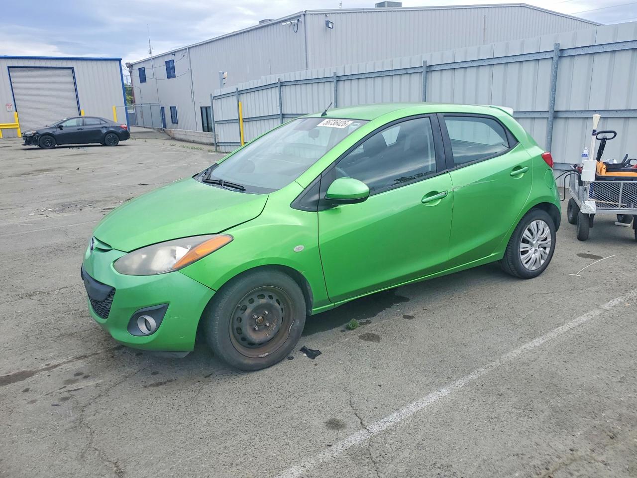 2012 Mazda Mazda2 Green vin: JM1DE1LZ1C0141019