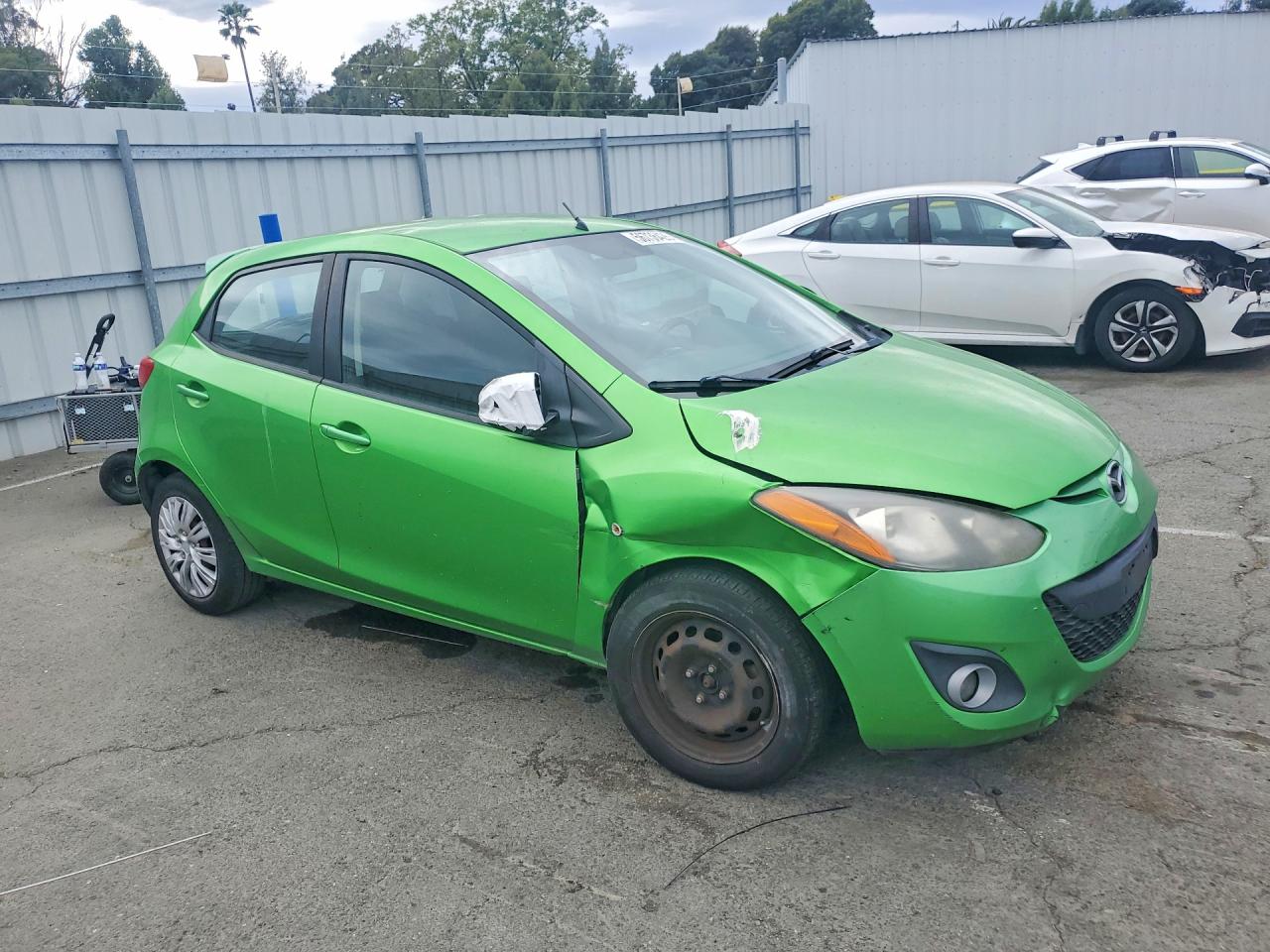 2012 Mazda Mazda2 Green vin: JM1DE1LZ1C0141019