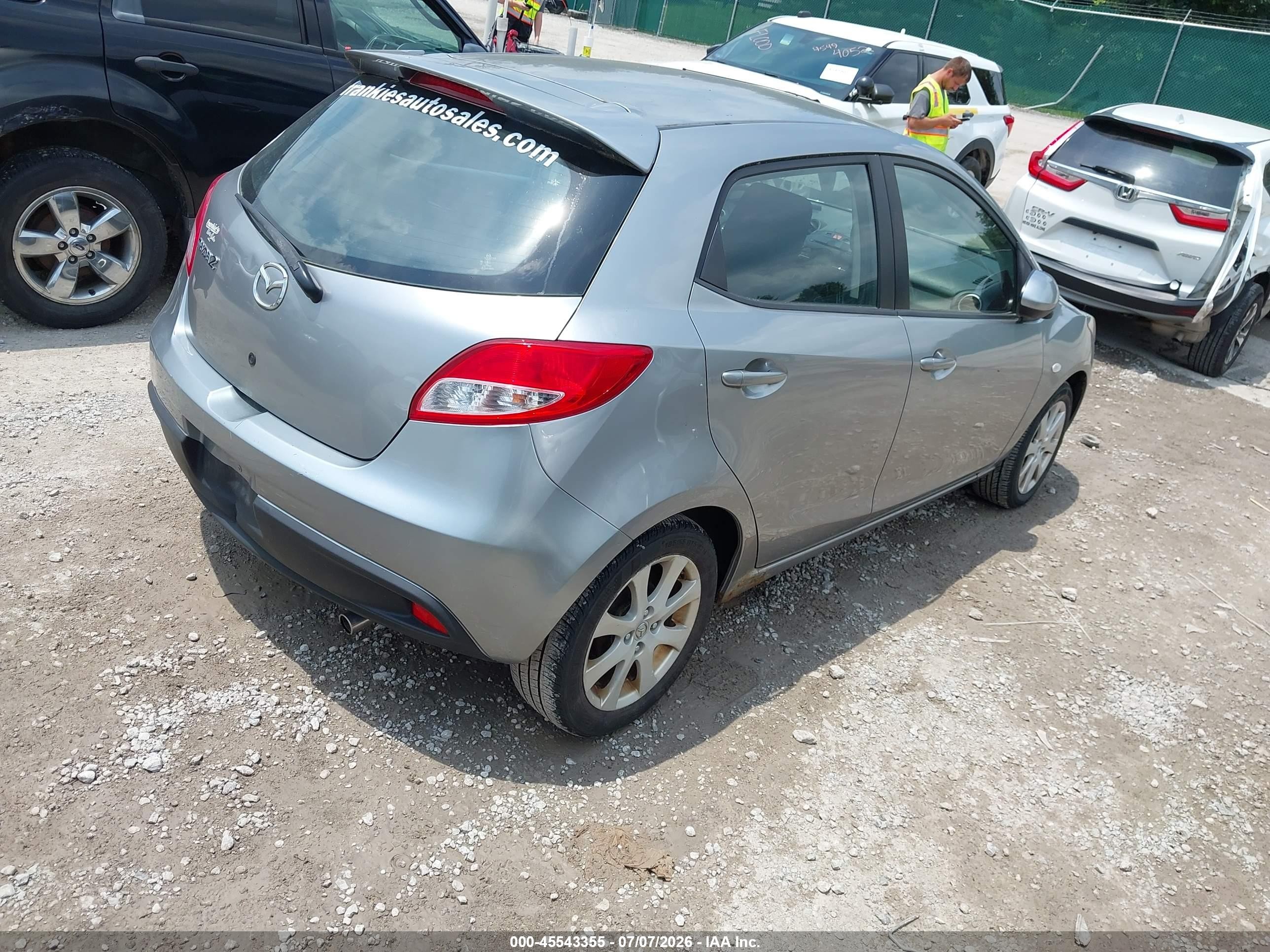 2012 Mazda Mazda2 Touring Silver vin: JM1DE1LZ7C0141932