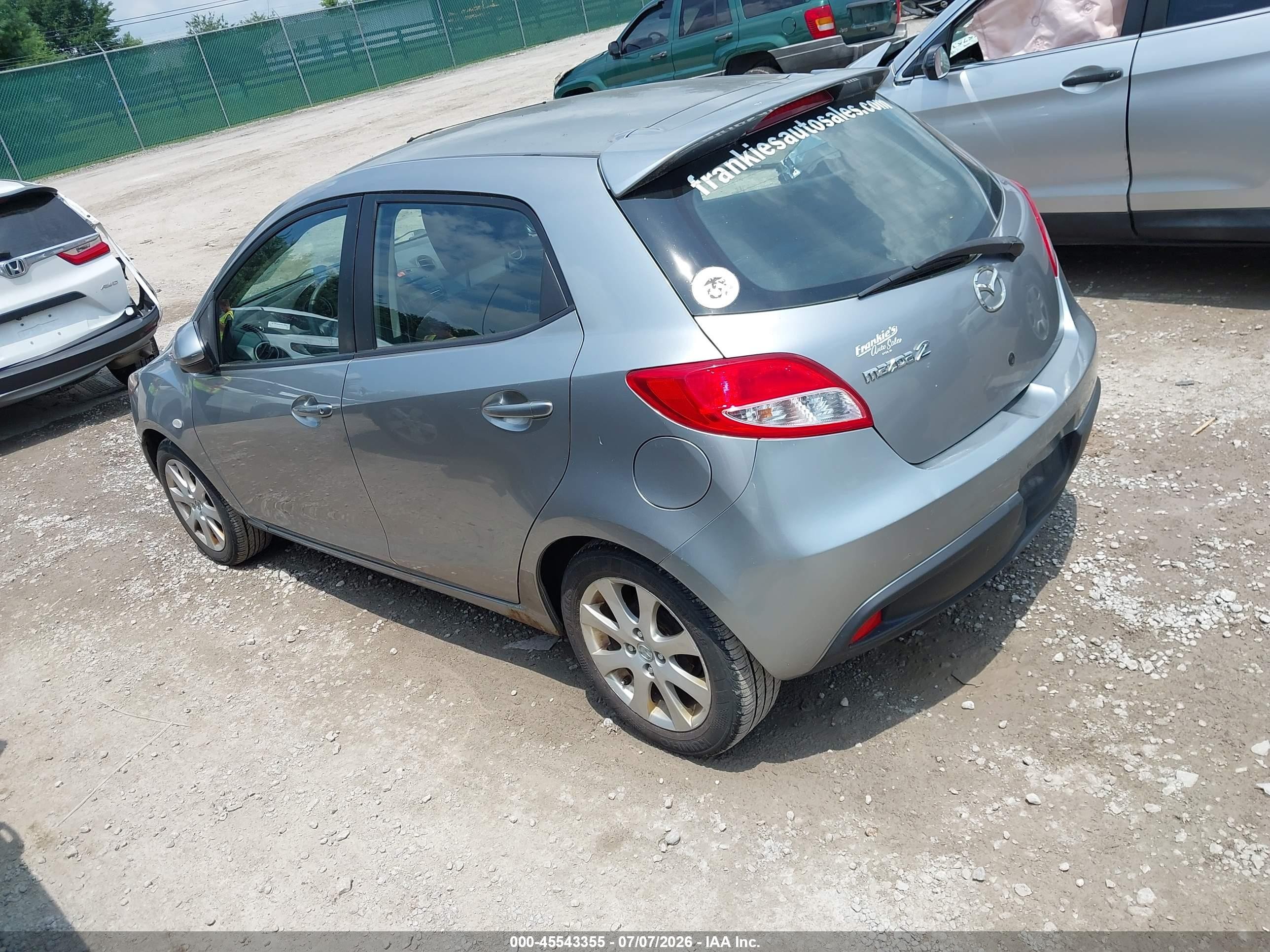 2012 Mazda Mazda2 Touring Silver vin: JM1DE1LZ7C0141932