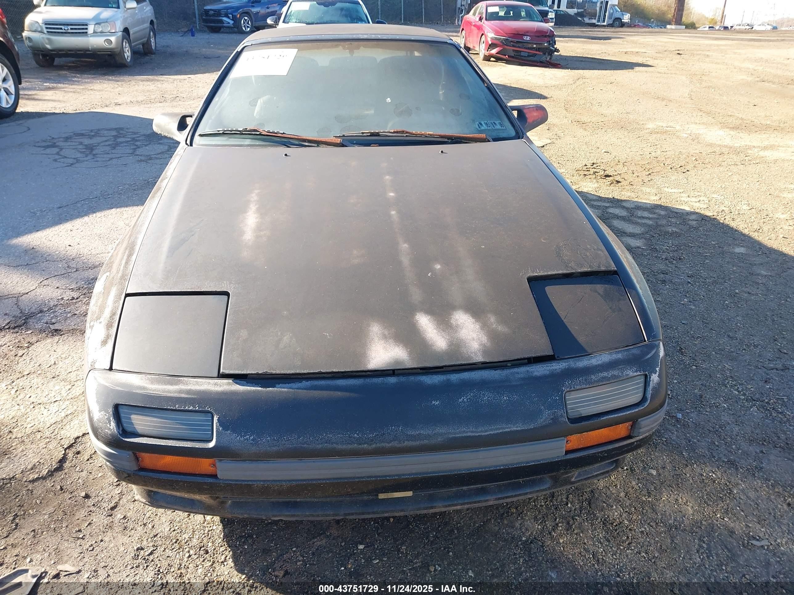 1988 Mazda Rx7   Black vin: JM1FC3513J0108585
