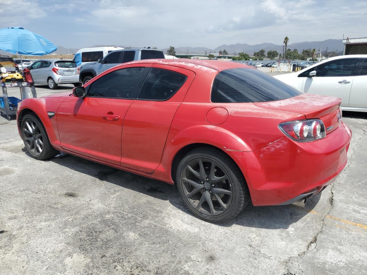 2009 Mazda Rx8 Red vin: JM1FE17M790401939