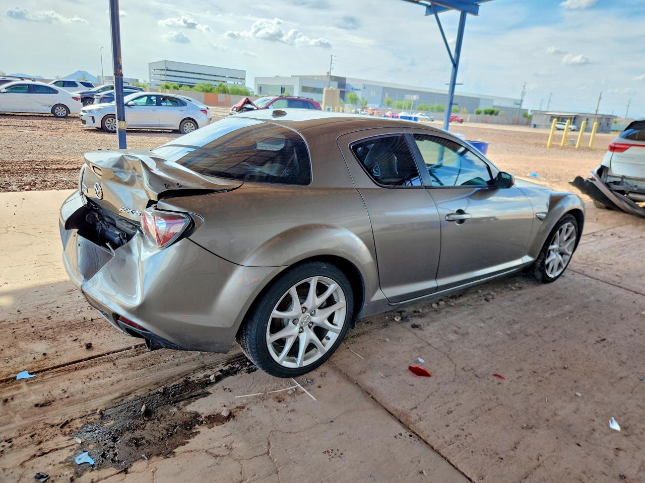 2009 Mazda Rx8 Gold vin: JM1FE17P990401421