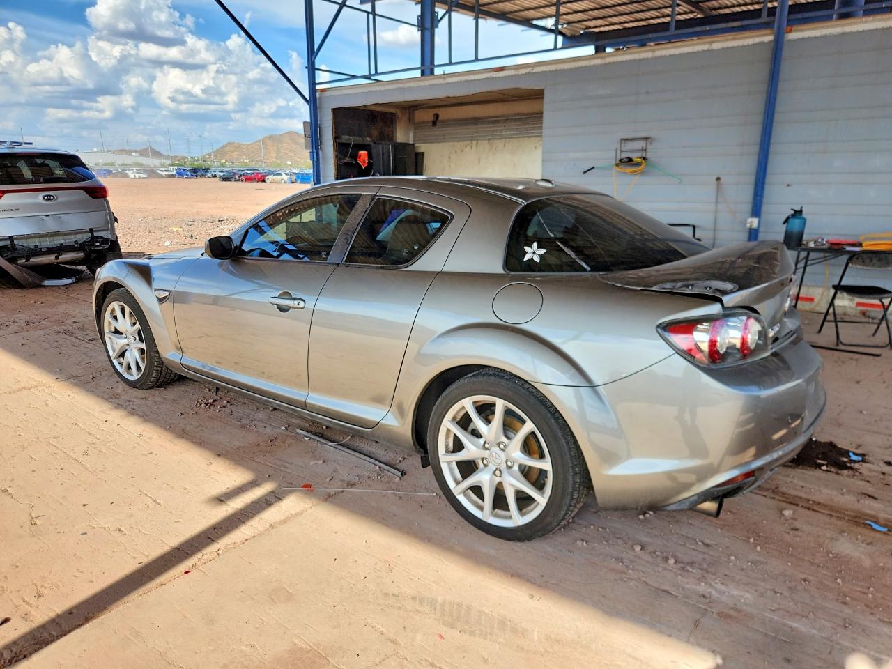 2009 Mazda Rx8 Gold vin: JM1FE17P990401421