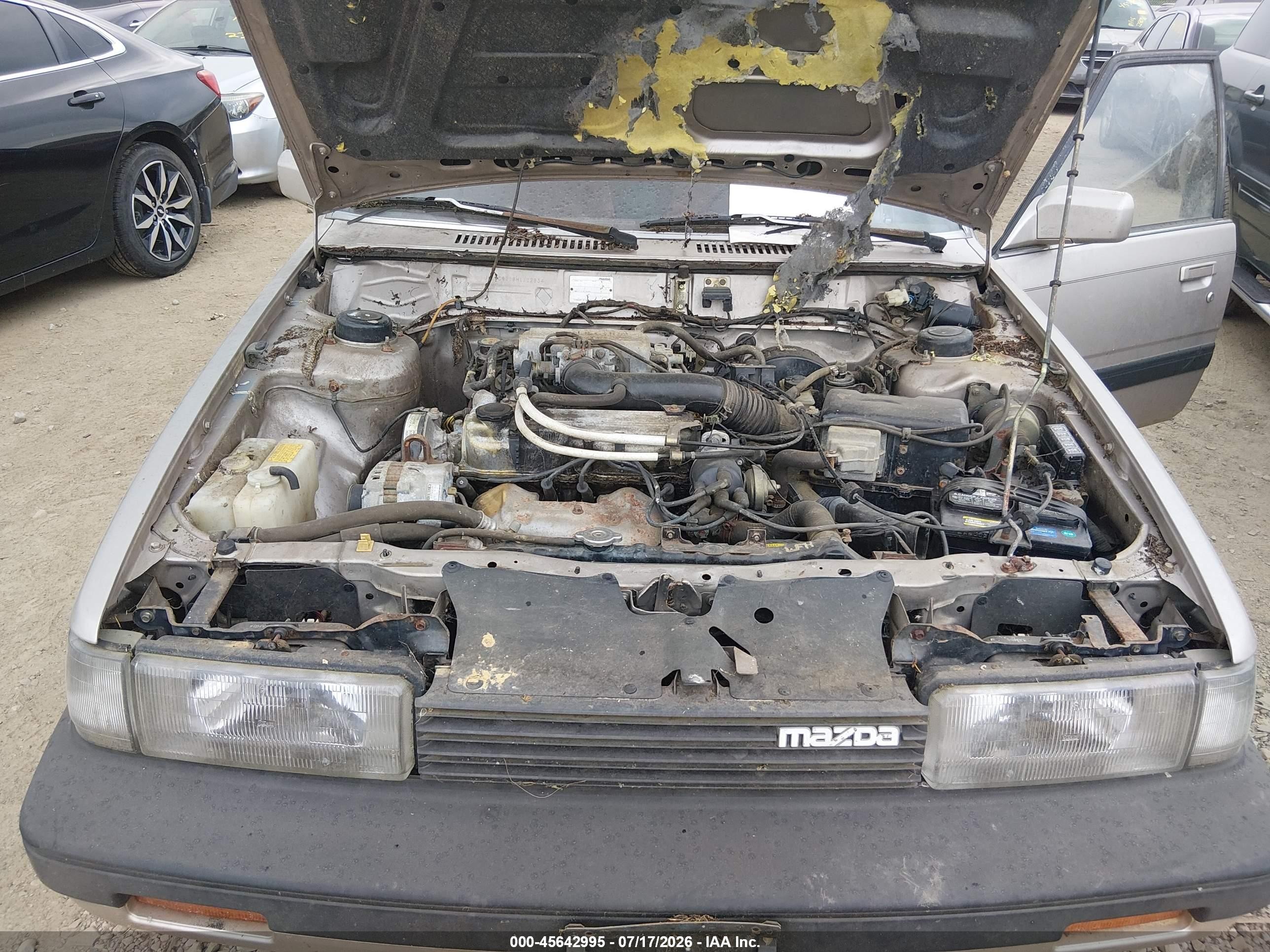 1987 Mazda 626   Gold vin: JM1GC2218H1112834