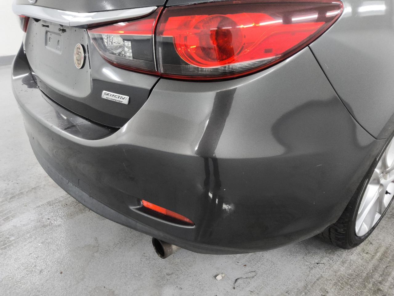 2015 Mazda 6 Touring Gray vin: JM1GJ1V51F1220028 Damage: Rear Bumper/Cover, Previous Repair, Acceptable