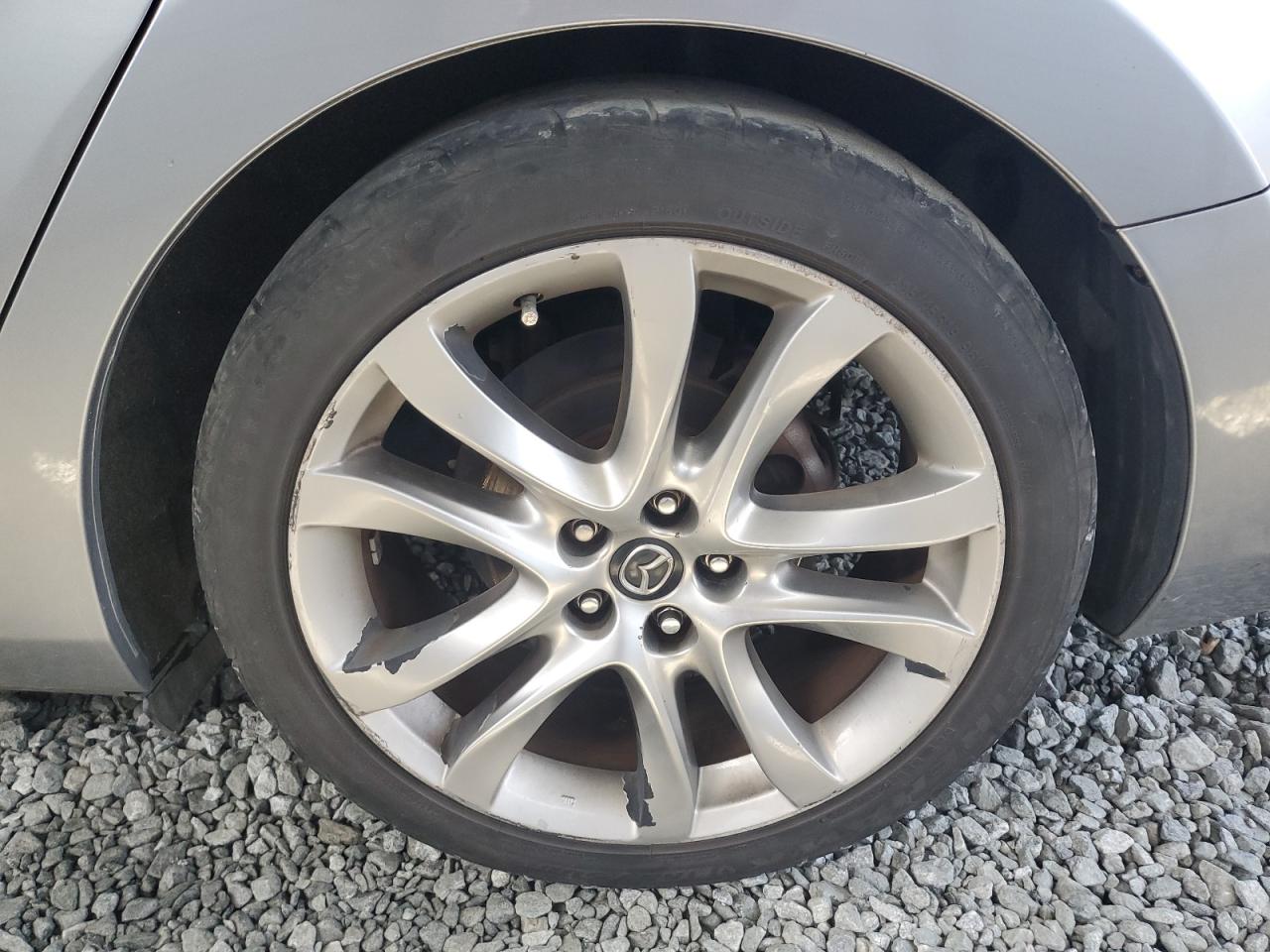 2014 Mazda 6 Grand Touring Silver vin: JM1GJ1W6XE1138109 Damage: Left Rear Wheel, Curb Rash, > 12 Inches
