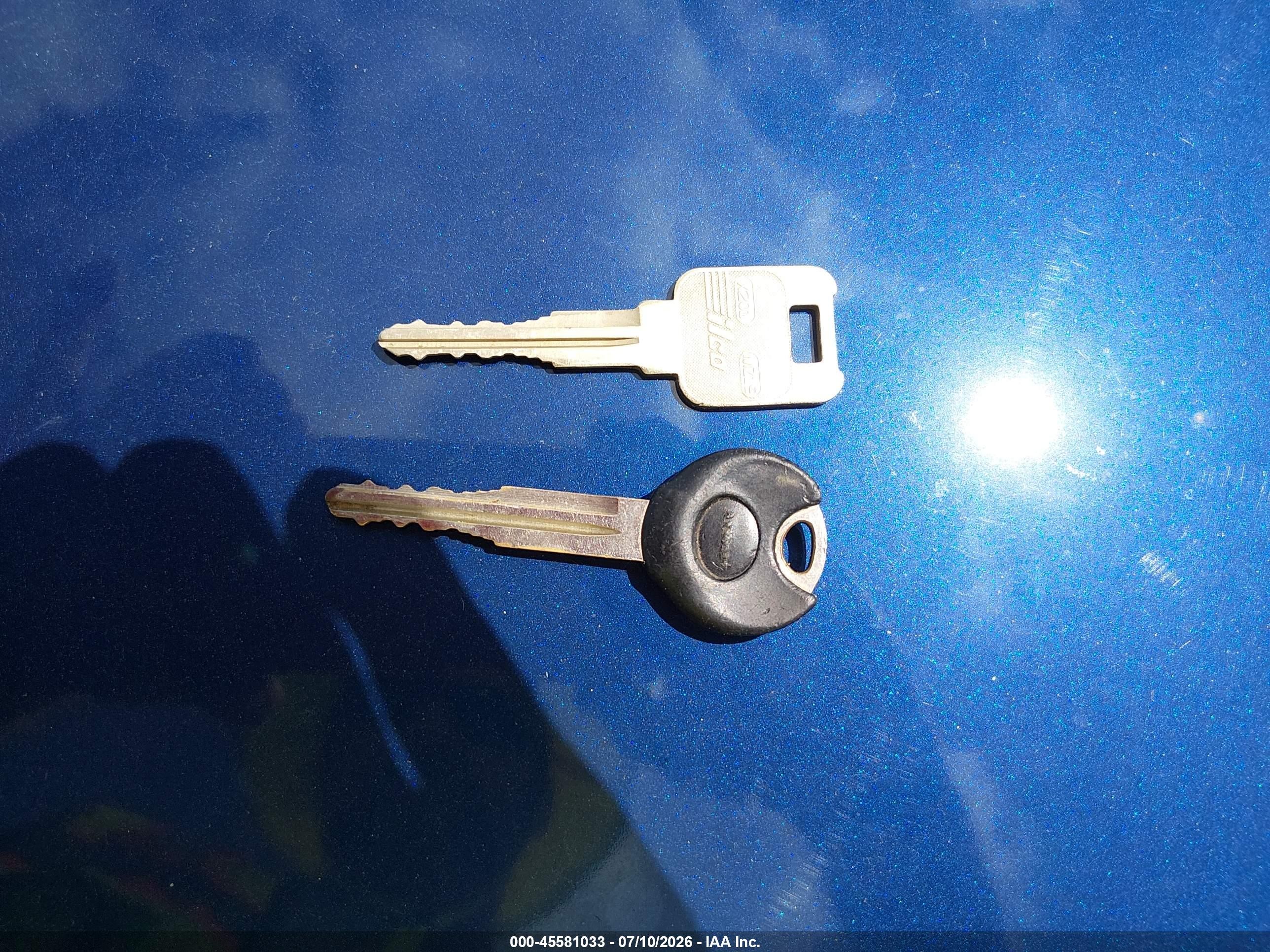 1990 Mazda Mx-5 Miata   Blue vin: JM1NA3512L0134423