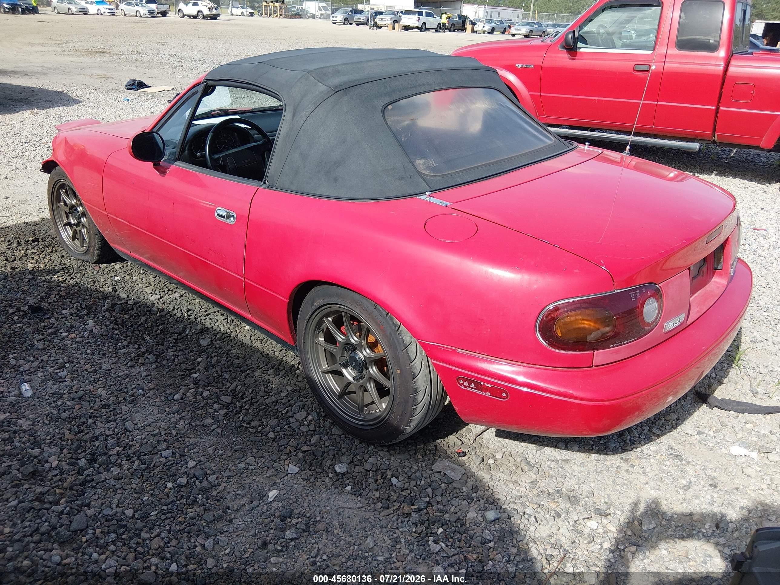 1990 Mazda Mx-5 Miata   Red vin: JM1NA3513L0121048