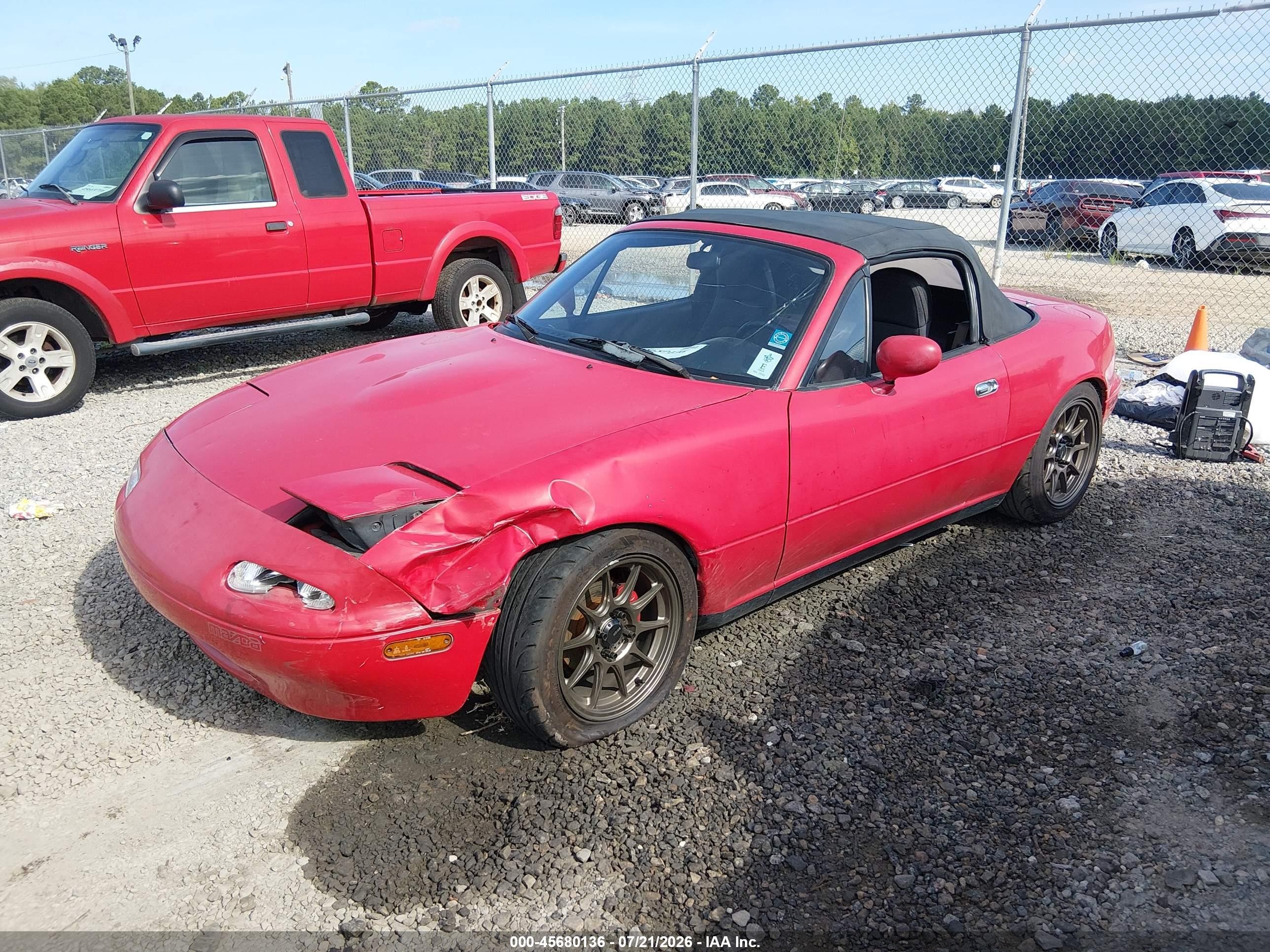 1990 Mazda Mx-5 Miata   Red vin: JM1NA3513L0121048