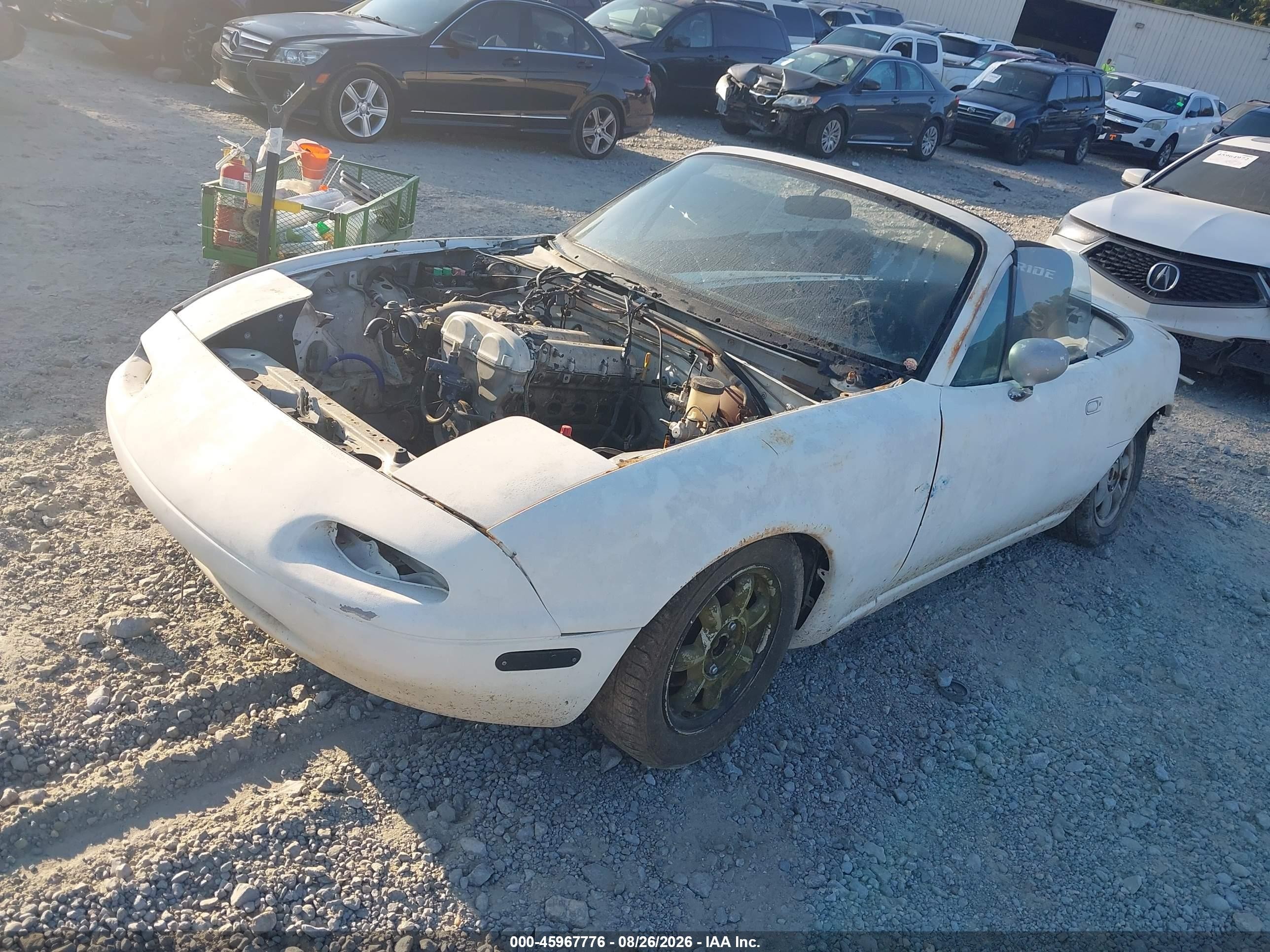 1990 Mazda Mx-5 Miata   White vin: JM1NA3514L0113444