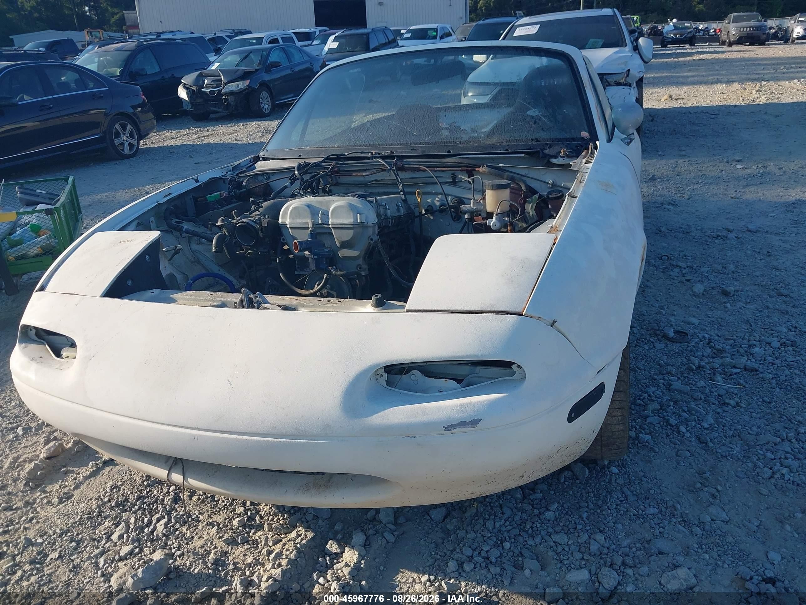 1990 Mazda Mx-5 Miata   White vin: JM1NA3514L0113444