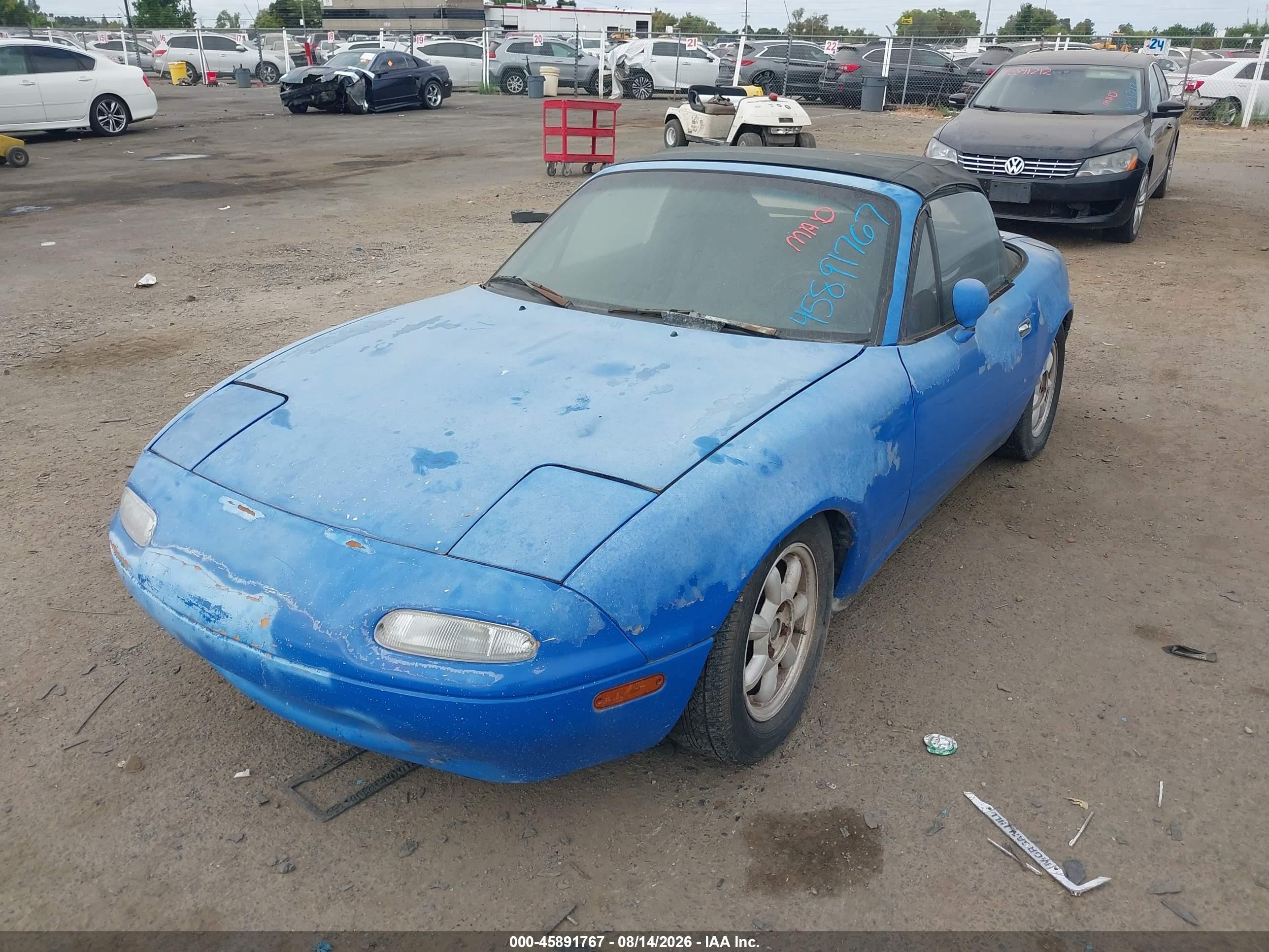 1990 Mazda Mx-5 Miata   Blue vin: JM1NA3514L0143785