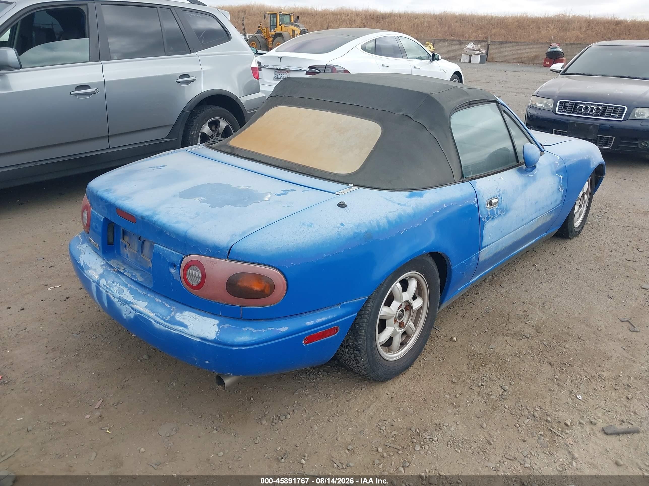 1990 Mazda Mx-5 Miata   Blue vin: JM1NA3514L0143785