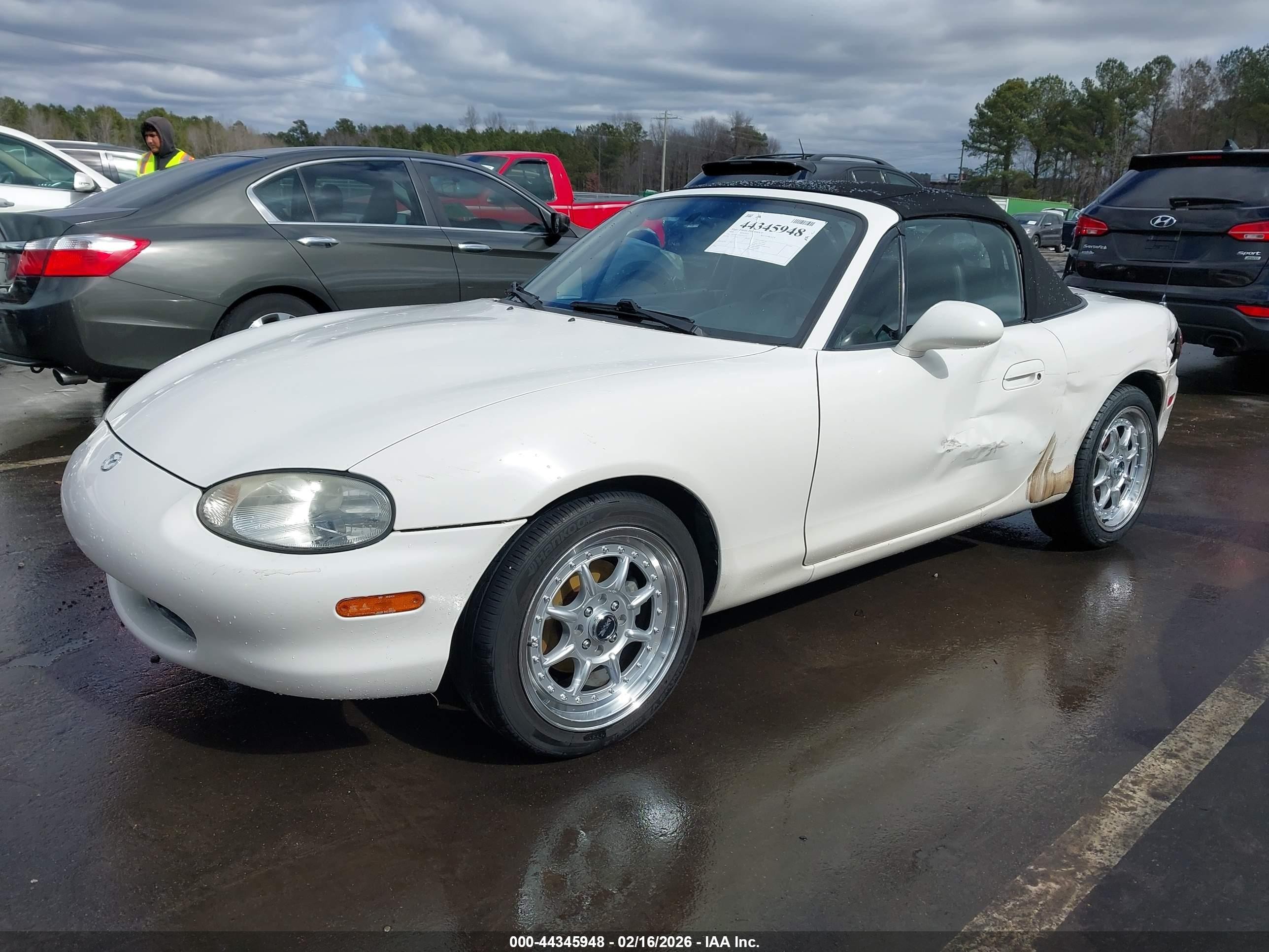 1999 Mazda Mx-5 Miata   White vin: JM1NB353XX0103571