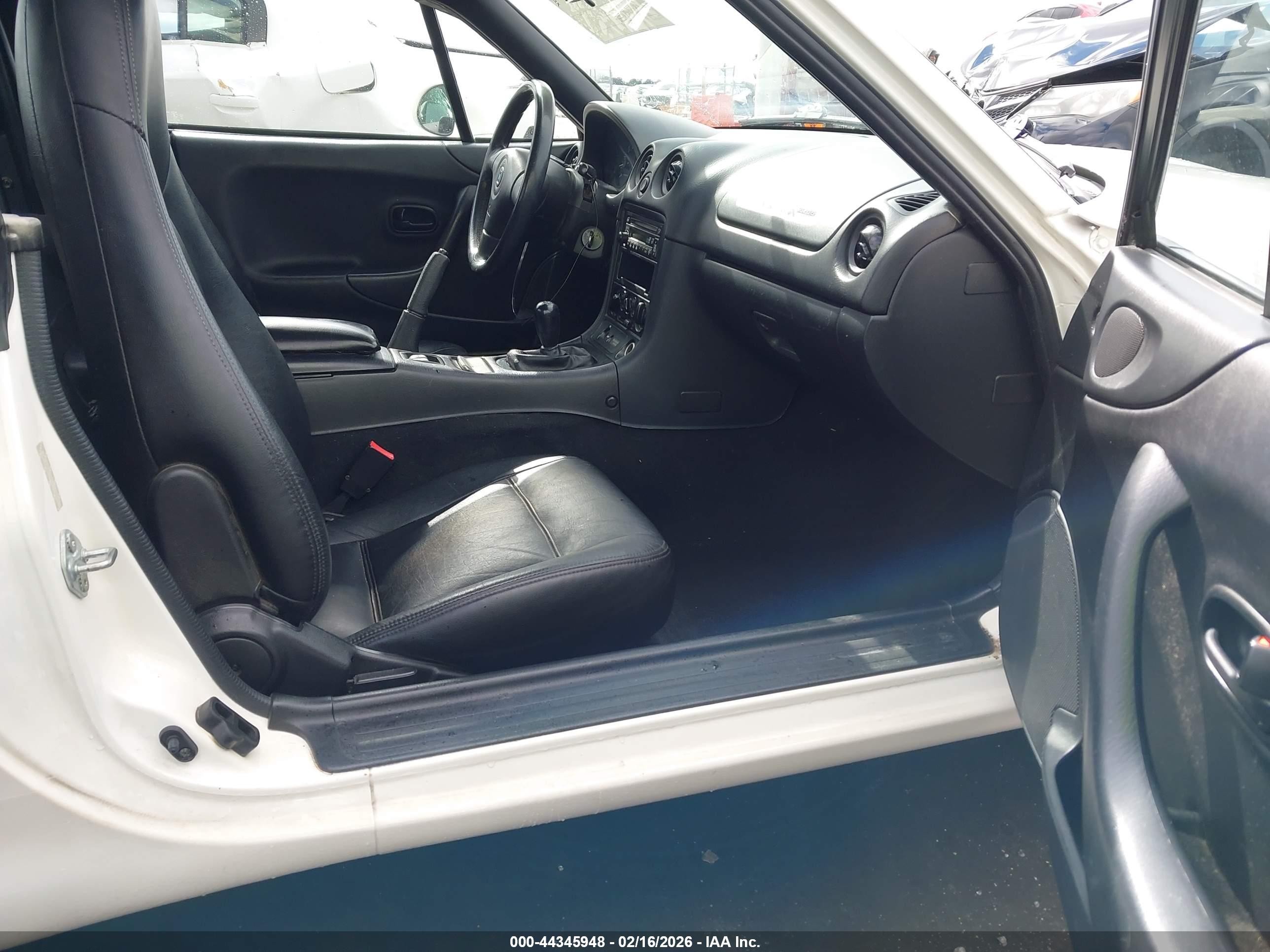 1999 Mazda Mx-5 Miata   White vin: JM1NB353XX0103571