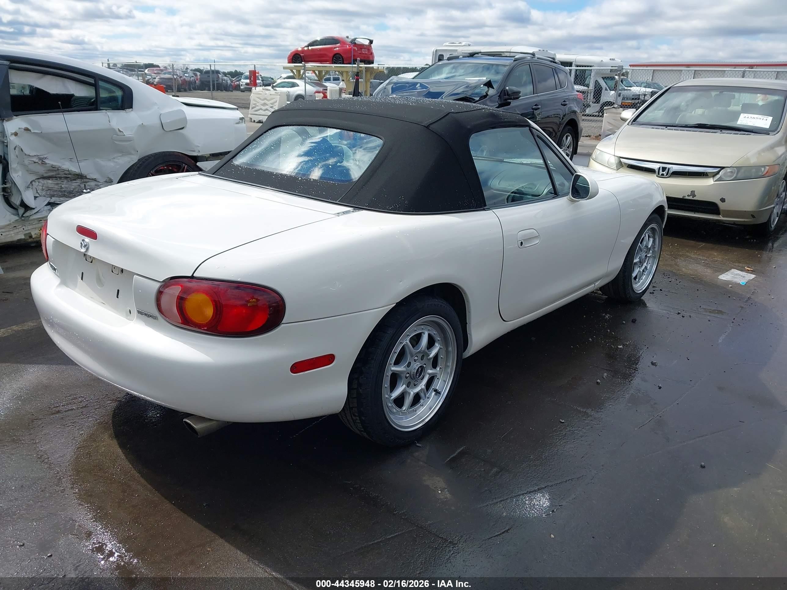 1999 Mazda Mx-5 Miata   White vin: JM1NB353XX0103571